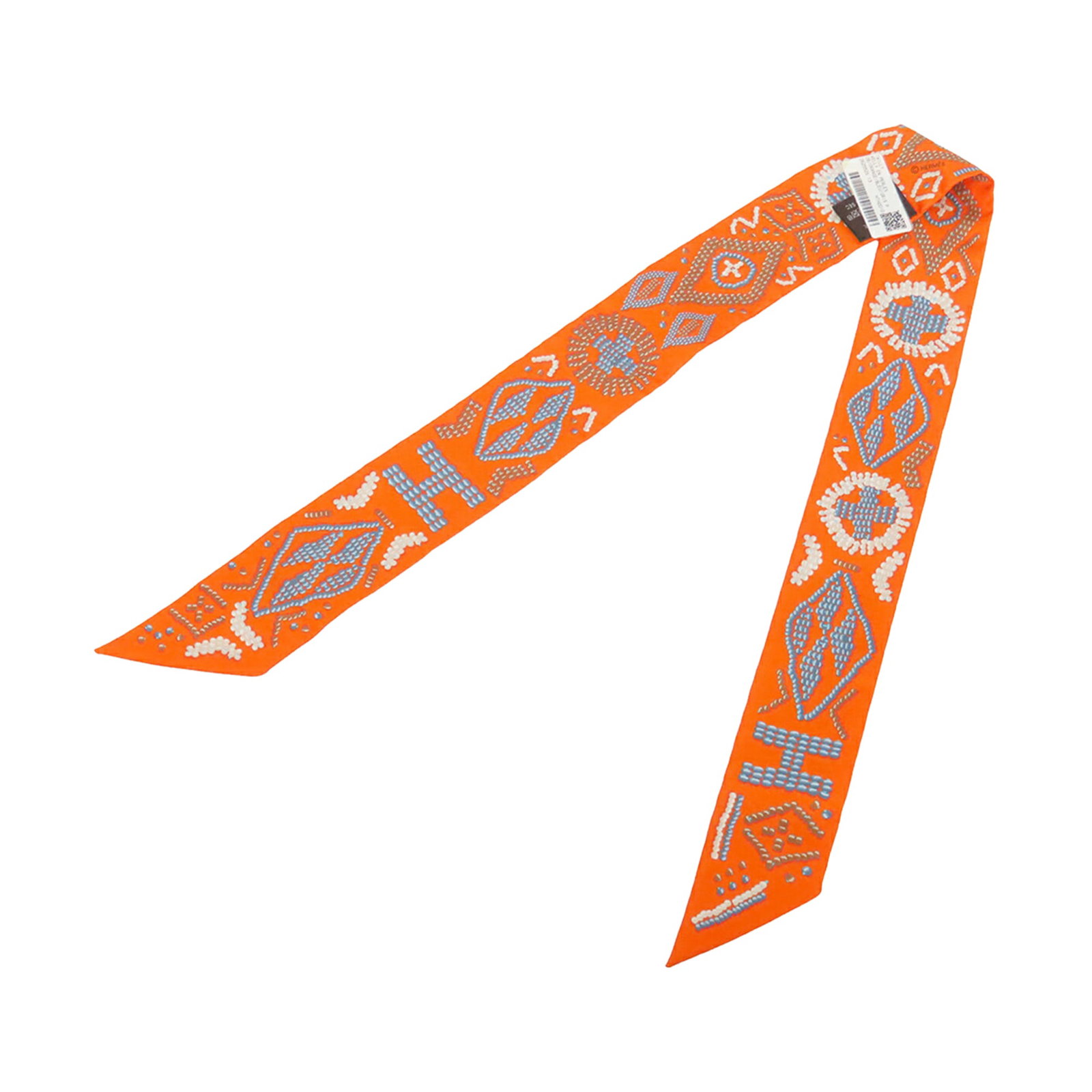 Hermes Kelly En Perles Twilly Silk Scarf Orange: Hermes Kelly En Perles Twilly Silk Scarf Orange Hermes Kelly En Perles Silk Twilly Scarf in orange, featuring a printed design on 100% silk. Made in France and presented as an accessory, this twilly s