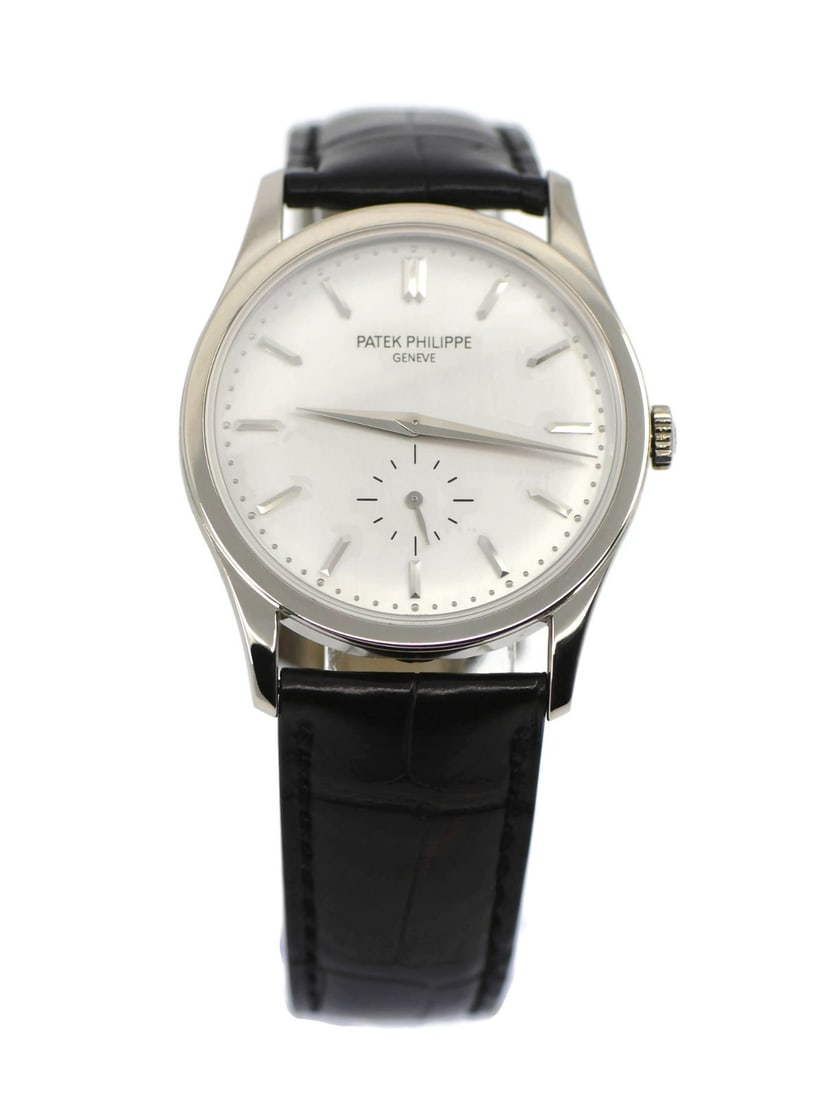 Patek Philippe Calatrava 18K White Gold Watch Ref 5196G Authentic: Patek Philippe Calatrava 18K White Gold Watch Ref 5196G Authentic Experience luxury with the Patek Philippe Calatrava 18K White Gold Watch, model 5196G. This exquisite wristwatch features a mechanical