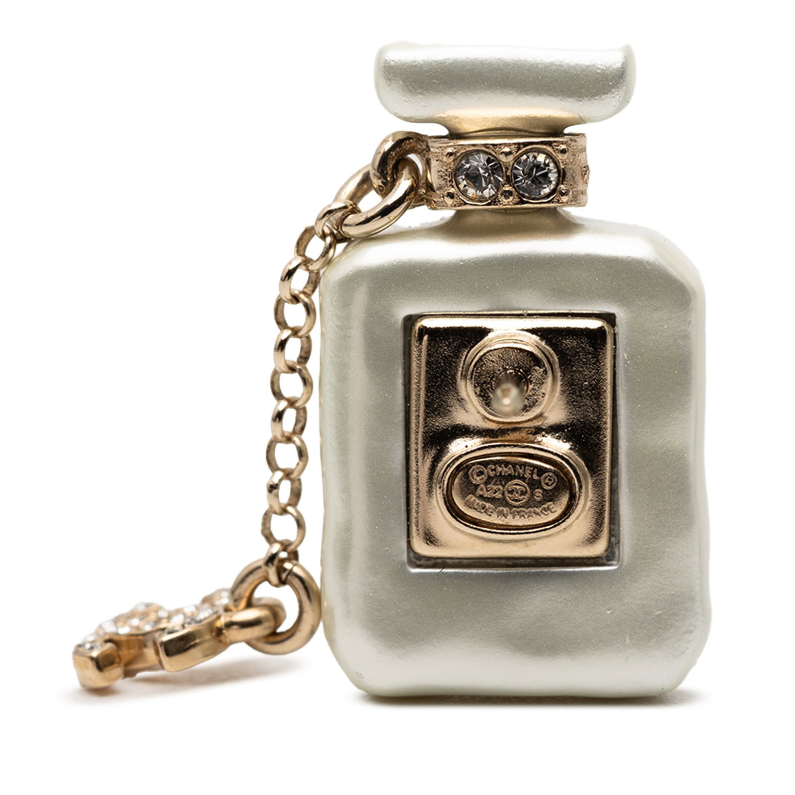Chanel No. 5 Perfume Bottle Brooch with Rhinestones and Gold Tone CC Resin: Chanel No. 5 Perfume Bottle Brooch with Rhinestones and Gold Tone CC Resin This Chanel brooch is designed in the shape of the iconic No. 5 perfume bottle and features a resin body with gold tone metal