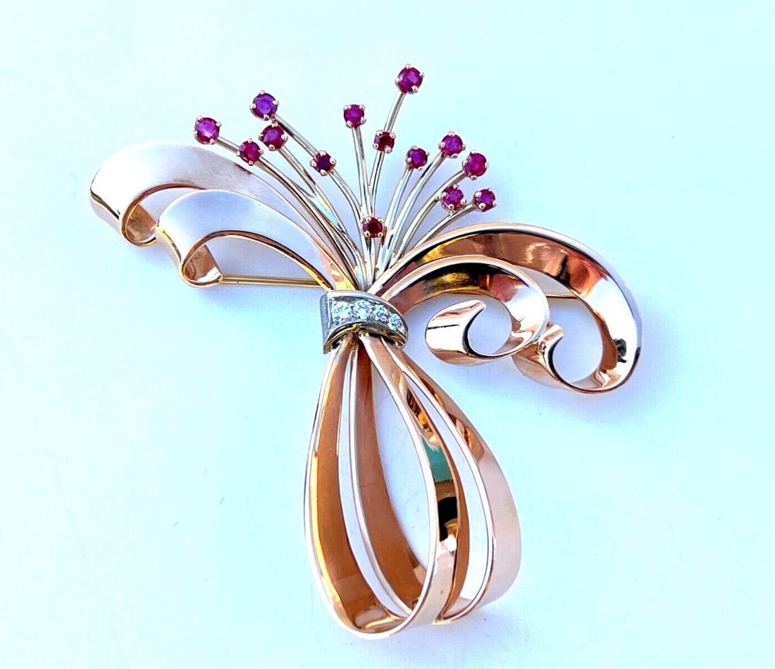 French 14K Rose Gold Platinum Ruby Diamond Flower Brooch: French 14K Rose Gold Platinum Ruby Diamond Flower Brooch This exquisite brooch features a stunning flower design crafted from a harmonious blend of 14K rose gold and platinum. The brooch is adorned wi
