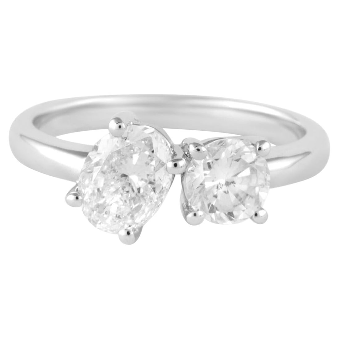 1.57ct Oval Round Diamond Toi Et Moi Ring 18k White Gold: 1.57ct Oval Round Diamond Toi Et Moi Ring 18k White Gold This exquisite 1.57ct Oval & Round Diamond Toi Et Moi Ring showcases a stunning contemporary design. Crafted in 18k white gold, it features one