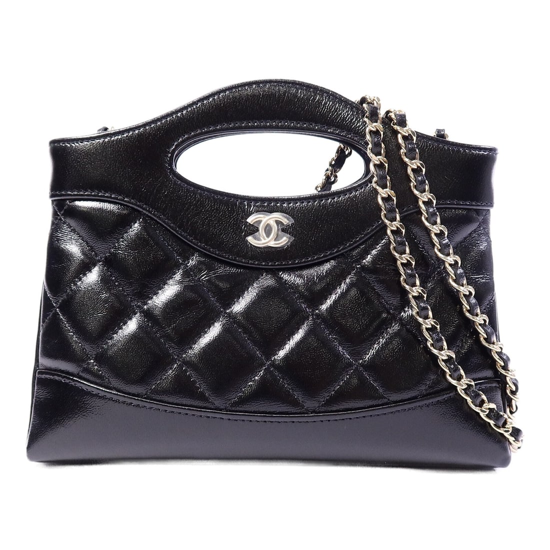 Chanel AP3656 Nano 31 Black Calfskin Chain Shoulder Bag CC GHW: Chanel AP3656 Nano 31 Black Calfskin Chain Shoulder Bag CC GHW A CHANEL Nano 31 Chain Shoulder Bag in black calfskin leather with gold-tone hardware. The bag features a chain shoulder strap, a magneti
