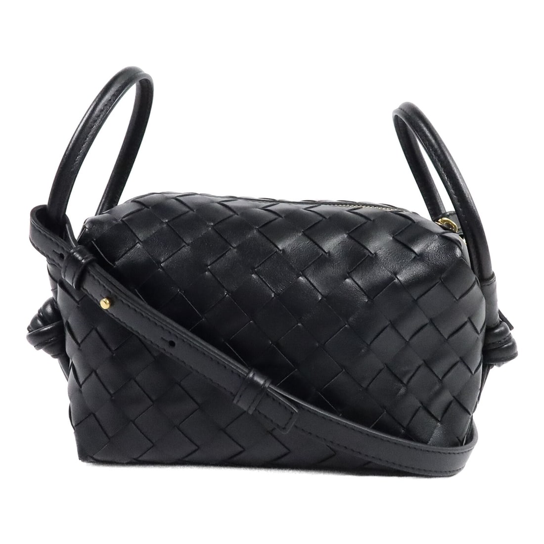 Bottega Veneta Loop Top Handle Shoulder Bag Black Lambskin: Bottega Veneta Loop Top Handle Shoulder Bag Black Lambskin Loop top handle shoulder bag in black lambskin leather with a structured compact silhouette and fastener pocket detail. Made in Italy. Includ