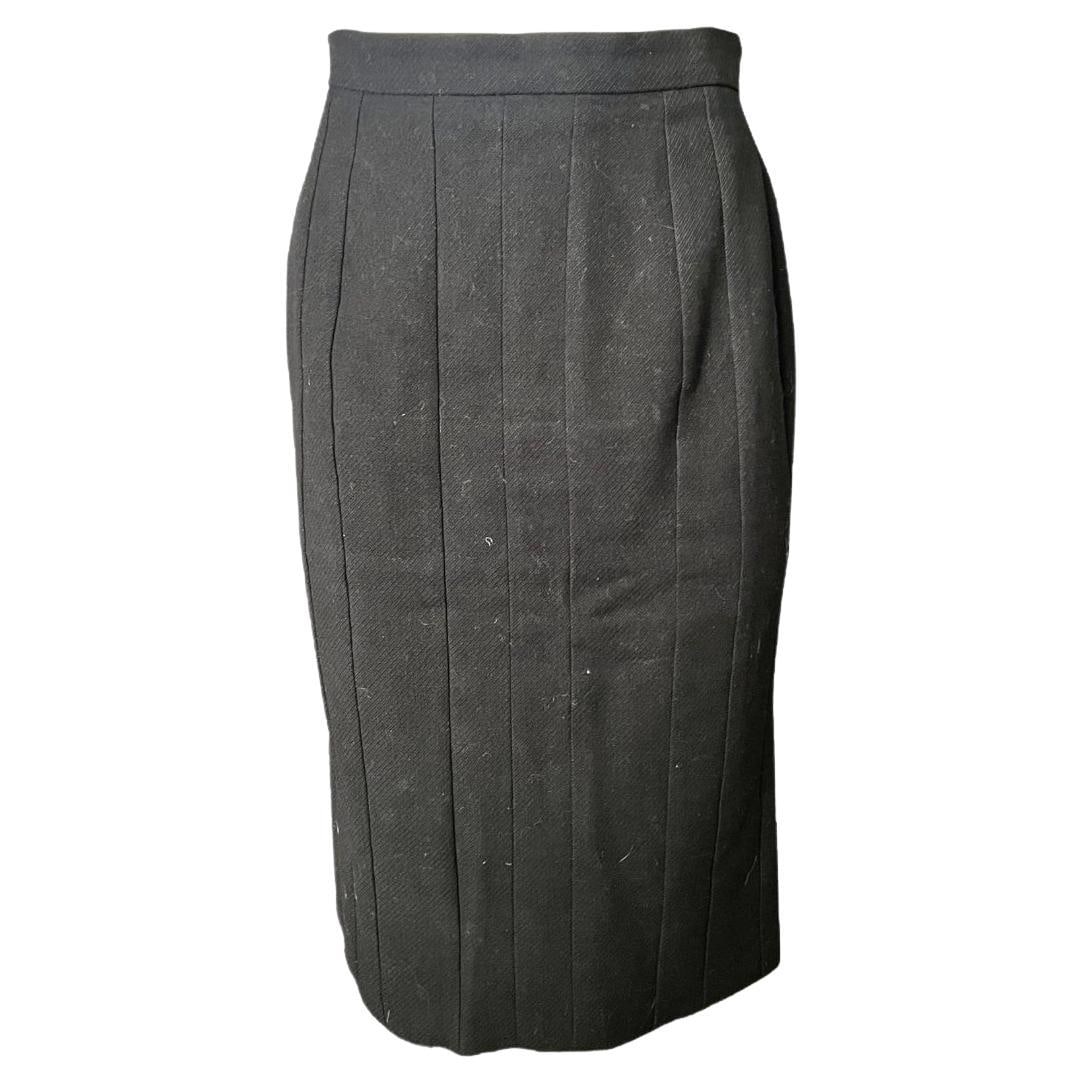 Lanvin Paris pencil skirt black wool ruffled Size 38: Lanvin Paris pencil skirt black wool ruffled Size 38 A black wool pencil skirt from Lanvin Paris, featuring a ruffled design, rear zip closure, and below-the-knee length. It was made in France and dat