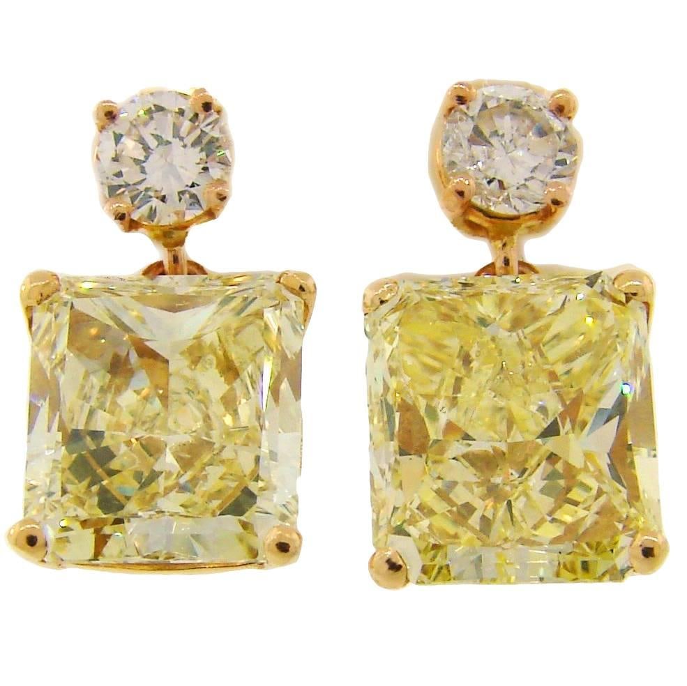 18k Rose Gold Drop Earrings with GIA Yellow and White Diamonds: 18k Rose Gold Drop Earrings with GIA Yellow and White Diamonds Classic and timeless two-stone stud drop earrings made of 18k tested rose gold. They feature two rectangular modified brilliant cut fancy