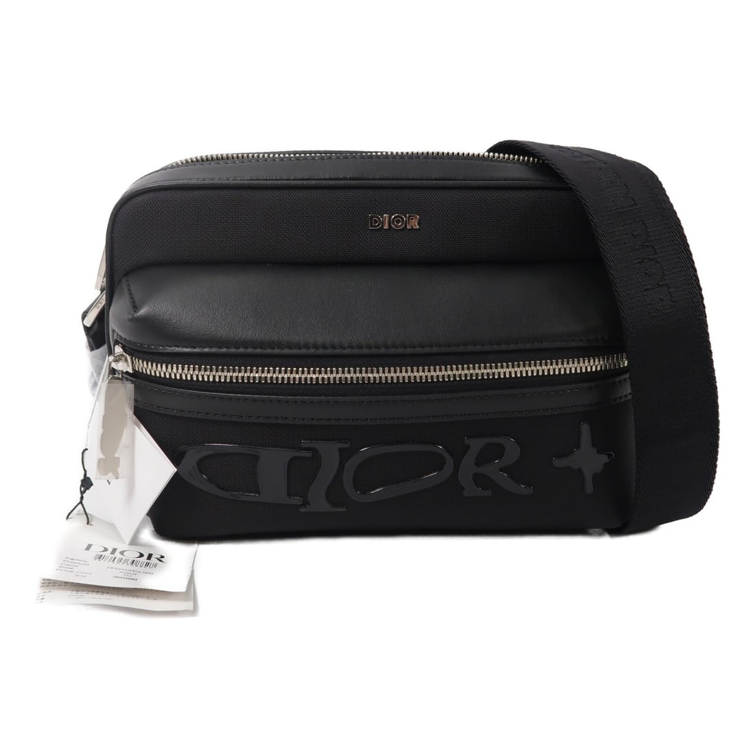 Dior Lewis Hamilton Rider 2.0 Black Shoulder Bag Calfskin Nylon: Dior Lewis Hamilton Rider 2.0 Black Shoulder Bag Calfskin Nylon Christian Dior CD Lewis Hamilton Rider 2.0 shoulder bag crafted in black calfskin leather and nylon. This men's bag features an adjustab