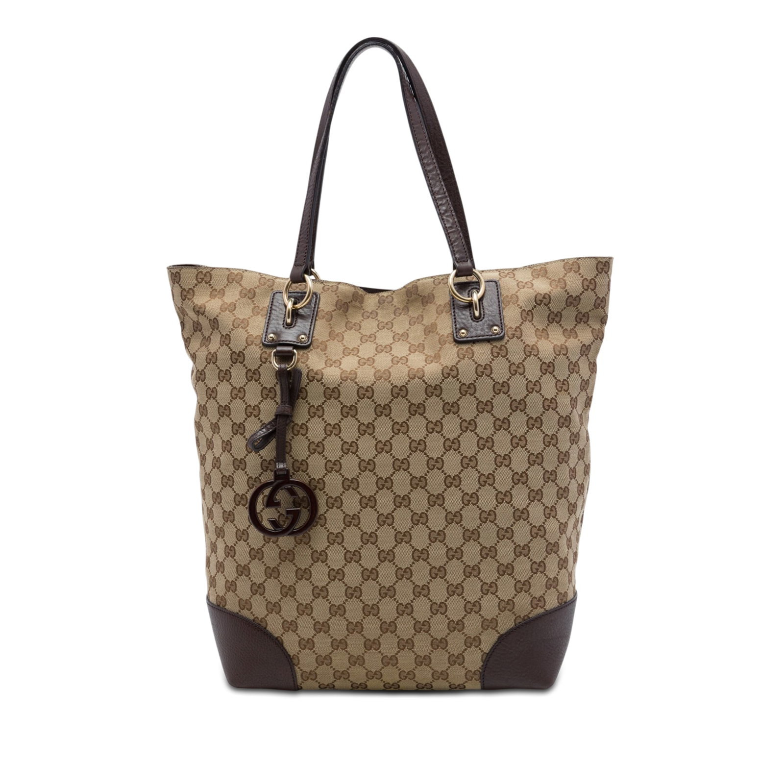 Gucci GG Charm Large Canvas Tote Bag with Leather Trim: Gucci GG Charm Large Canvas Tote Bag with Leather Trim Gucci Large GG Canvas GG Charm Tote crafted with a canvas body and leather trim. The bag features flat leather handles, an open top with magnetic