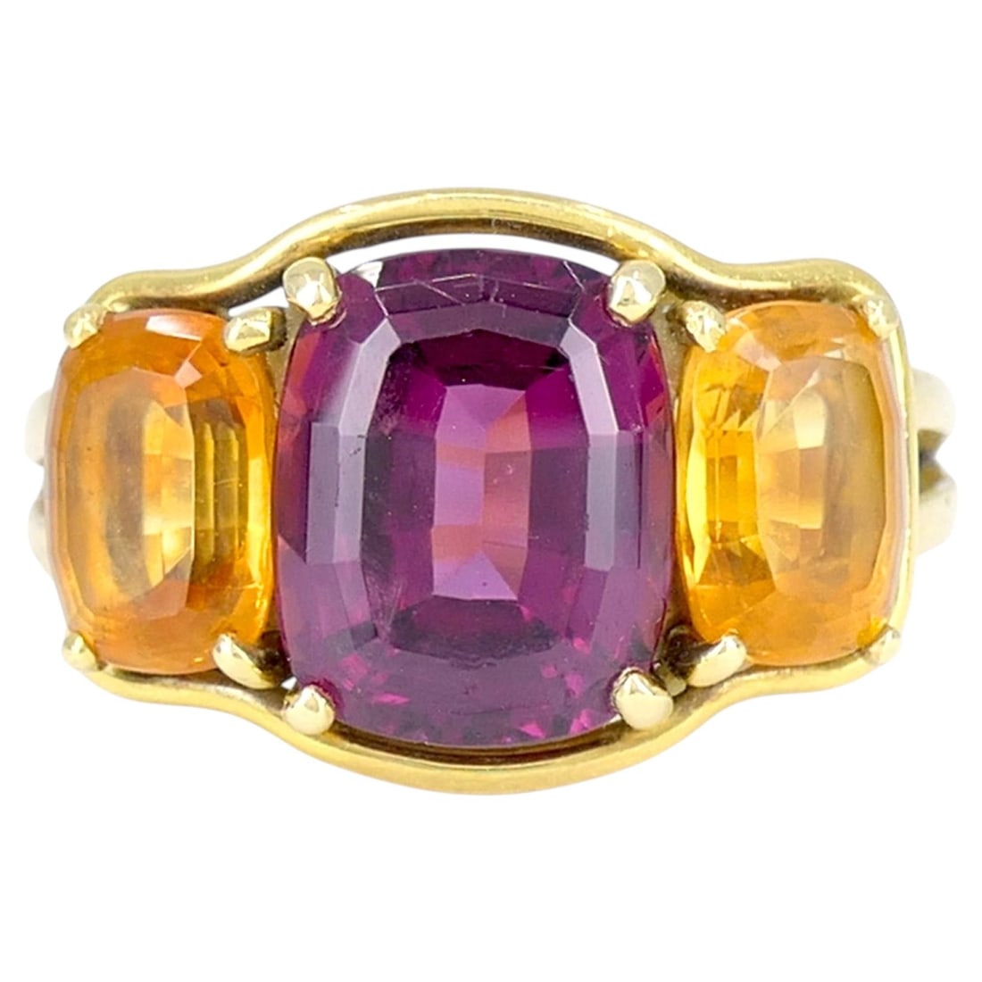 Verdura 18k Yellow Gold 3 Stone Ring with Rubellite and Madeira Citrine: Verdura 18k Yellow Gold 3 Stone Ring with Rubellite and Madeira Citrine A Verdura three-stone ring crafted in 18k yellow gold and set with a central rubellite flanked by two Madeira citrine gemstones.