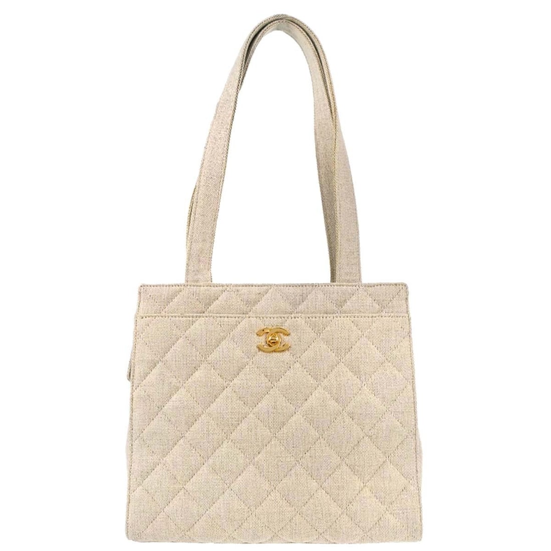CHANEL Large Beige Canvas Tote Bag with Dust Bag: CHANEL Large Beige Canvas Tote Bag with Dust Bag Large Chanel tote handbag in beige canvas with brown double handles and a magnetic closure. The bag features two exterior pockets plus one interior