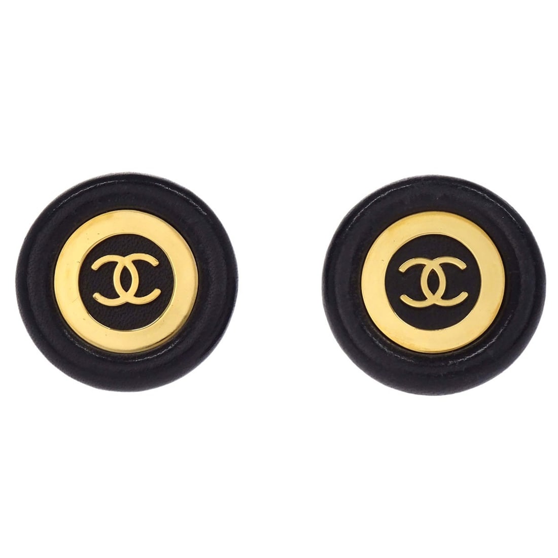 Chanel 93P black button clip earrings gold tone: Chanel 93P black button clip earrings gold tone Chanel button clip-on earrings in black with gold-tone detailing and logo theme. Made in France, this pair features a classic round button design. The e