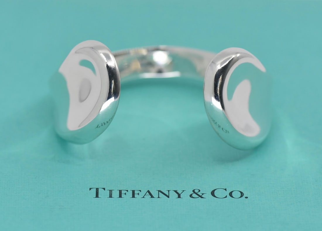 Elsa Peretti Sterling Silver Bangle by Tiffany & Co: Elsa Peretti Sterling Silver Bangle by Tiffany & Co This Tiffany & Co. Elsa Peretti bracelet is crafted from 925 sterling silver and features a sleek bangle style. Designed as part of the renowned Els