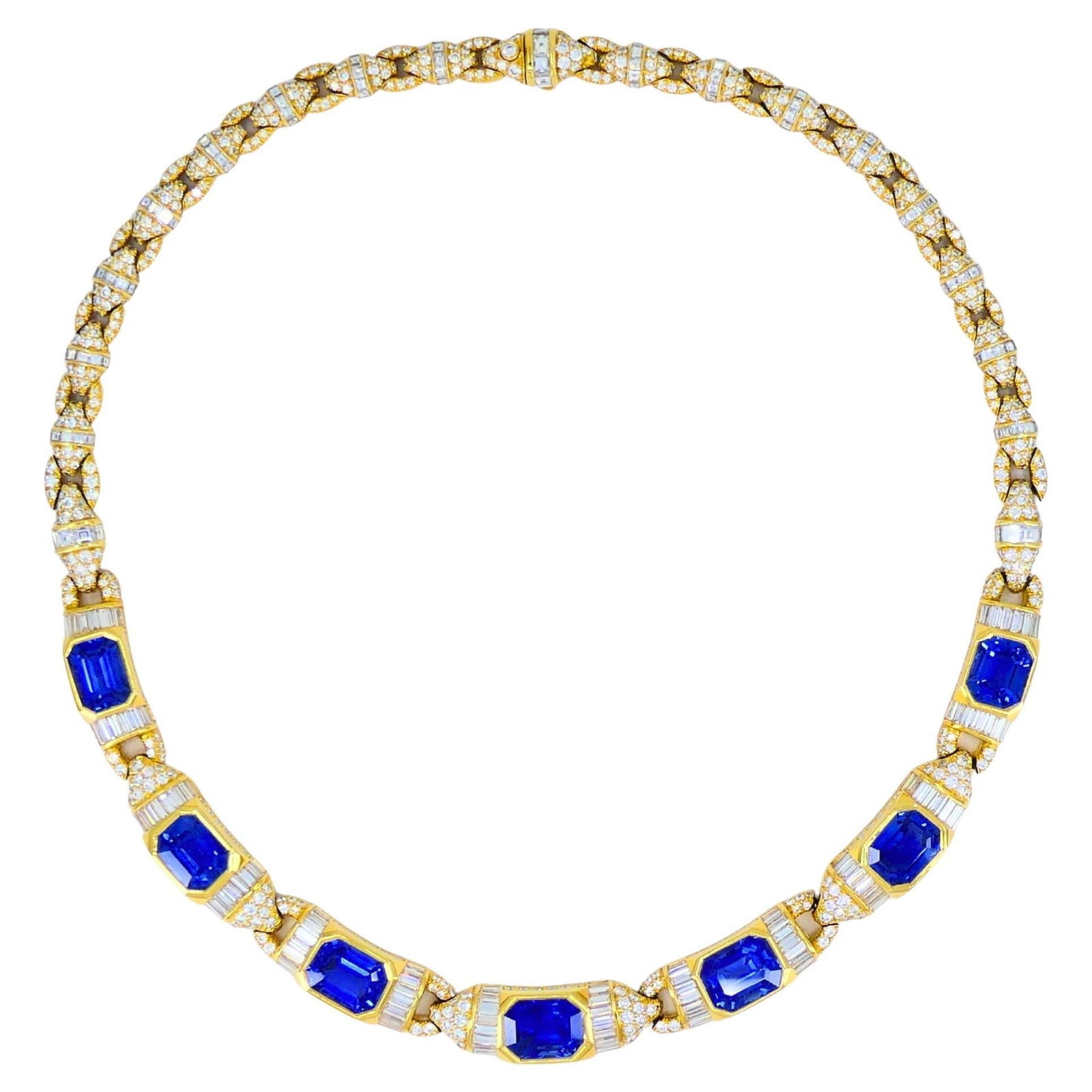 Bvlgari sapphire and diamond necklace in 18k yellow gold 39.77 cts: Bvlgari sapphire and diamond necklace in 18k yellow gold 39.77 cts Vintage Bvlgari necklace in 18k yellow gold, set with diamonds and seven natural Sri Lanka sapphires with no heat treatment. The sapp