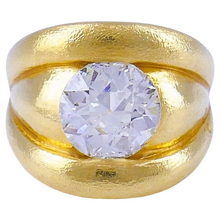 18k Yellow Gold Cocktail Ring with 4.86ct Old European Cut Diamond: 18k Yellow Gold Cocktail Ring with 4.86ct Old European Cut Diamond An impressive cocktail ring featuring a flush-mounted 4.86-carat Old European cut diamond set in a chunky 18k yellow gold band. The r