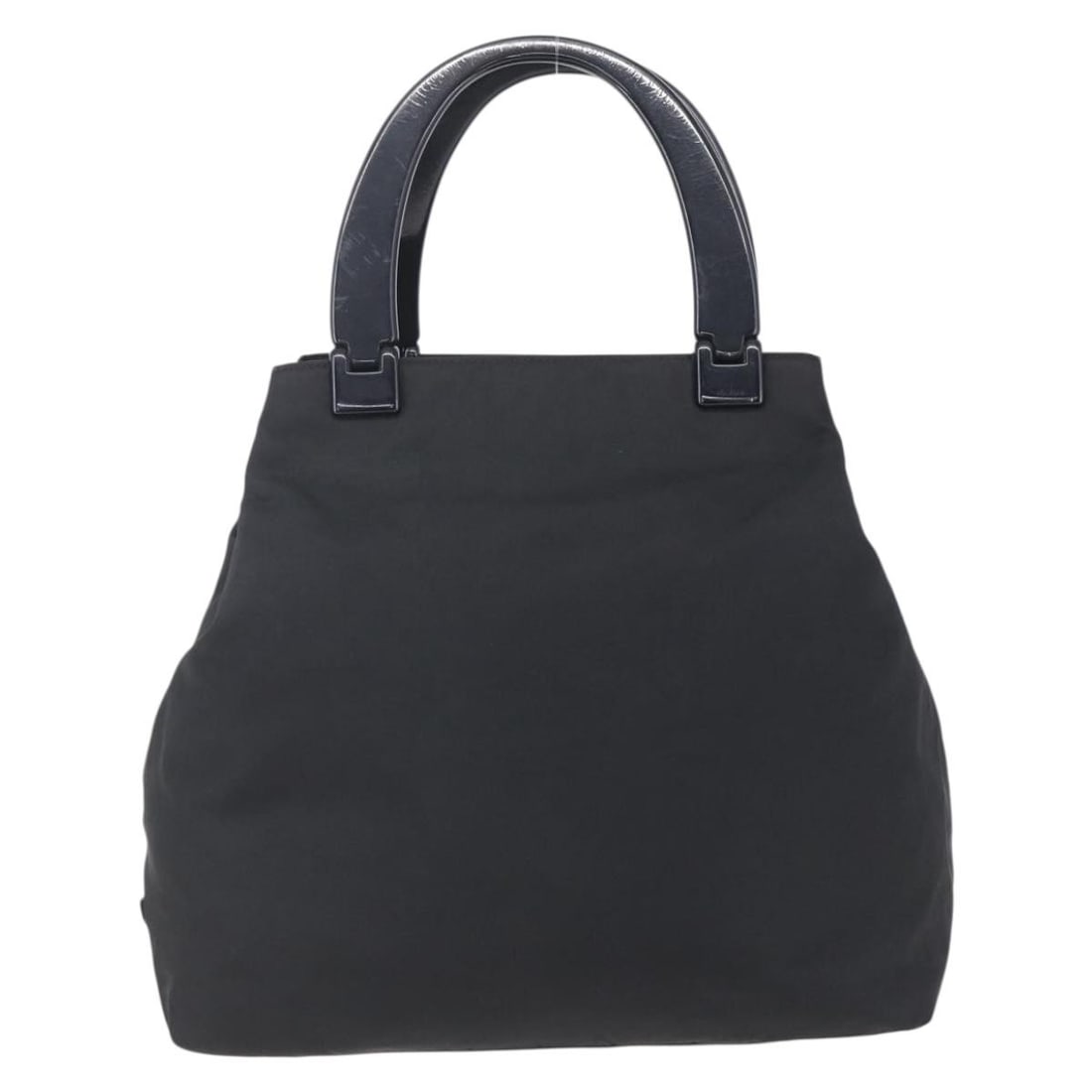 Prada Vintage Black Nylon Handbag Made in Italy: Prada Vintage Black Nylon Handbag Made in Italy This vintage Prada handbag is crafted from black nylon and designed for women. It features a spacious interior with signs of use including rubbing, stai