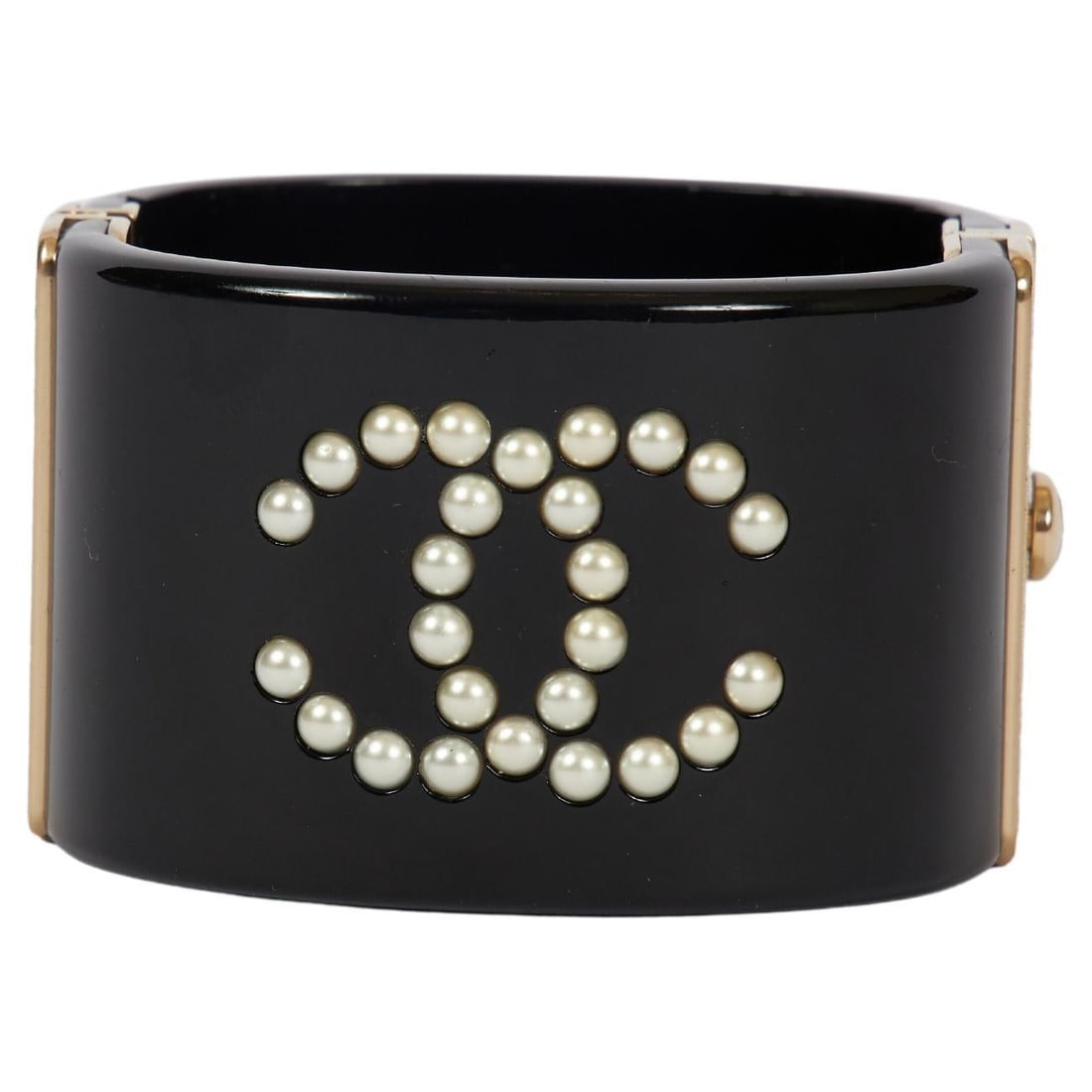 Chanel Spring 2016 Lucite Cuff Bracelet with Faux Pearls: Chanel Spring 2016 Lucite Cuff Bracelet with Faux Pearls Black Lucite hinged cuff bracelet from the Spring 2016 collection, set with faux pearls and featuring the Chanel logo. Original box is included