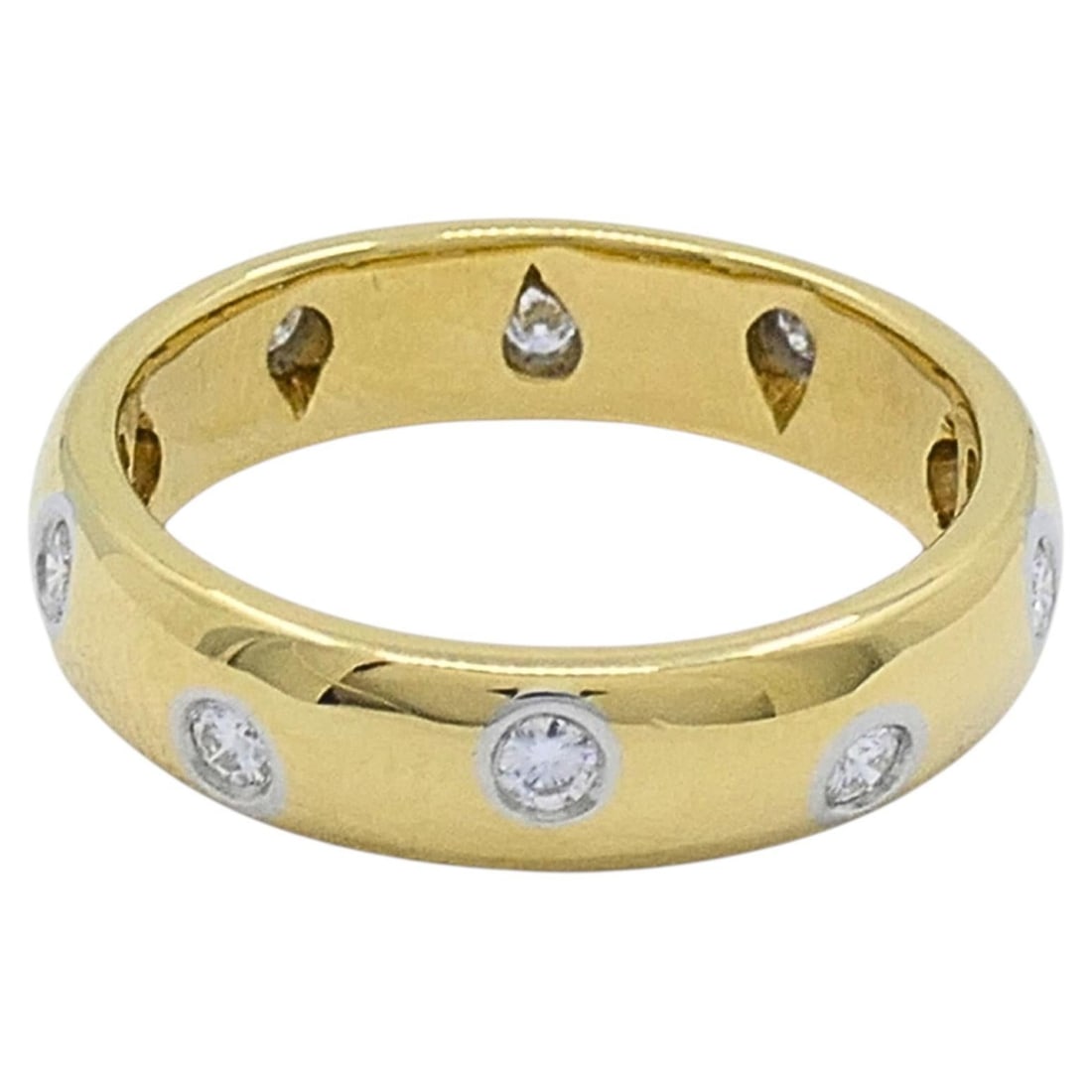 Tiffany & Co. Diamond Band Ring in 18k Gold and Platinum: Tiffany & Co. Diamond Band Ring in 18k Gold and Platinum Tiffany & Co. diamond band ring crafted in 18k yellow gold with platinum accents. The ring features a full circle of round diamonds set in smoo