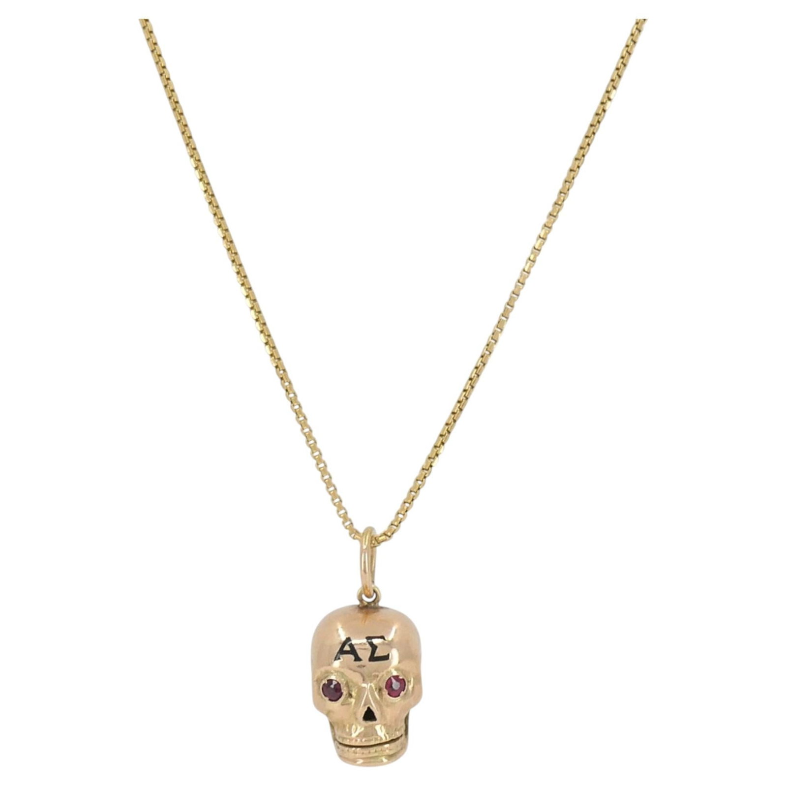 1918 Antique 14k Gold Skull Pendant Necklace with Ruby Eyes: 1918 Antique 14k Gold Skull Pendant Necklace with Ruby Eyes Antique skull pendant necklace dating to 1918, crafted in 14k rose gold with round-cut ruby eyes. The three-dimensional skull design feature