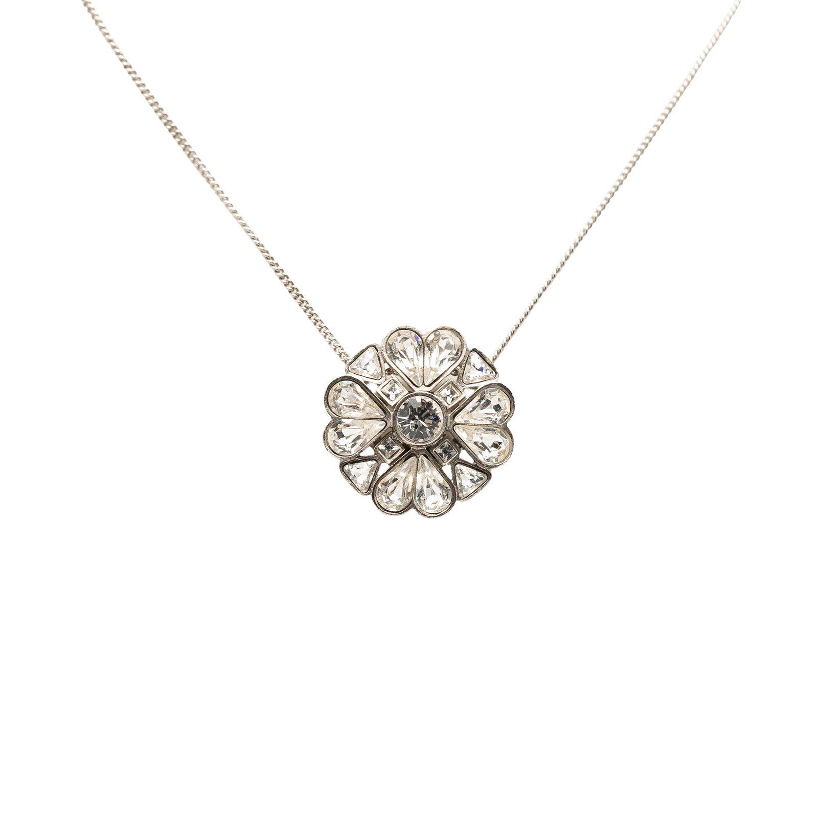 Chanel CC Clover Pendant Necklace Silver Tone Crystal: Chanel CC Clover Pendant Necklace Silver Tone Crystal Chanel CC Brass Strass Clover pendant necklace with a silver-tone plated chain and pendant accented by crystal embellishments. This costume jewelr