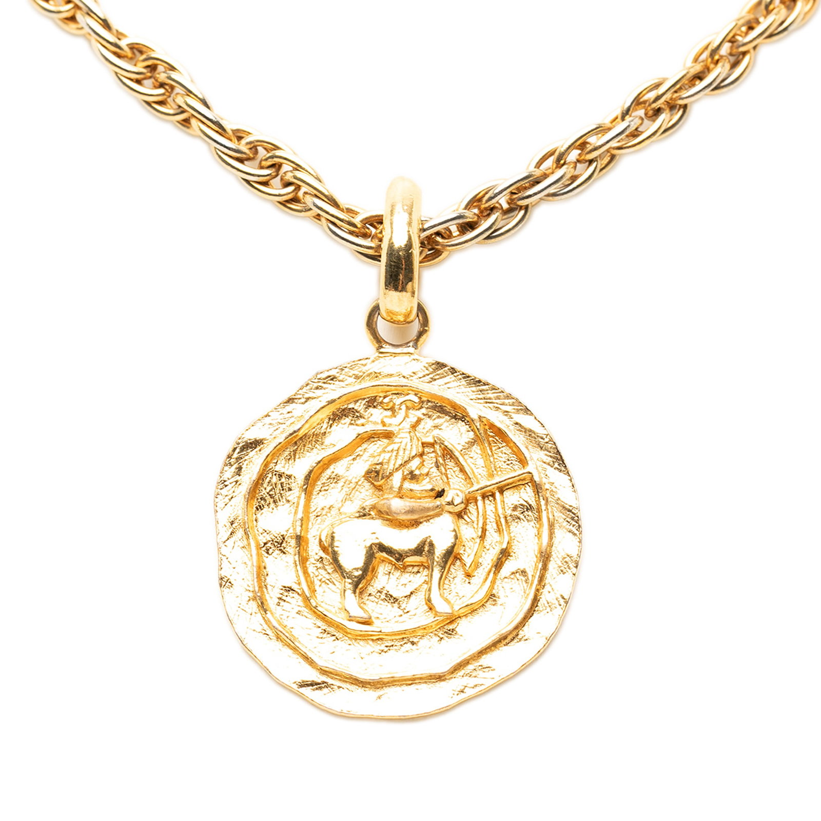 Chanel Centaur Medallion Pendant Necklace Gold Plated CC: Chanel Centaur Medallion Pendant Necklace Gold Plated CC Gold plated metal pendant necklace with a hook closure. The piece is identified as a Chanel CC Gold Plated Centaur Medallion Pendant Necklace, 