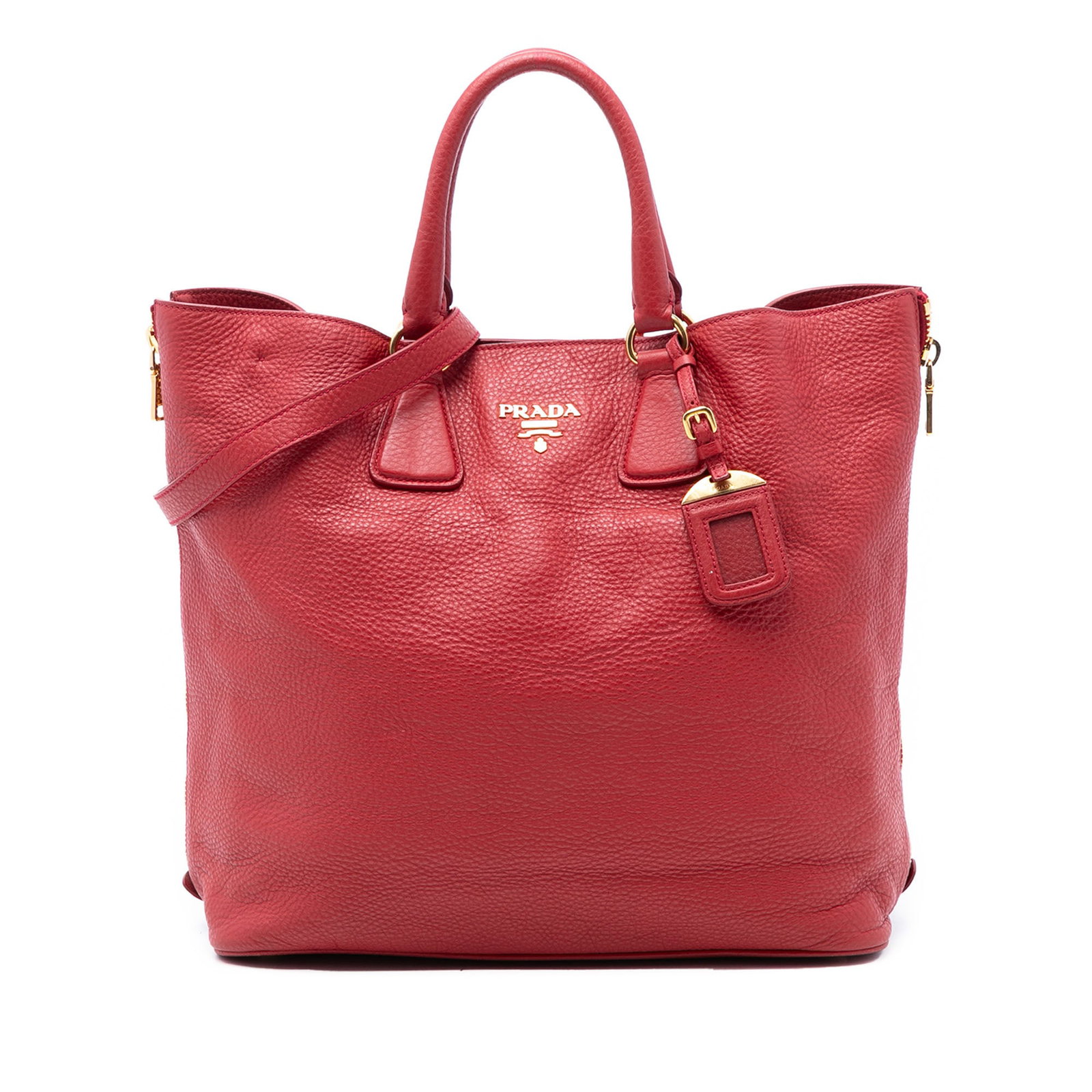 Prada Vitello Daino Leather Red Tote with Side Zip Expansions: Prada Vitello Daino Leather Red Tote with Side Zip Expansions This Prada Vitello Daino Side Zip Shopper Tote is crafted from red leather and features rolled leather handles, side zip expansions, and a