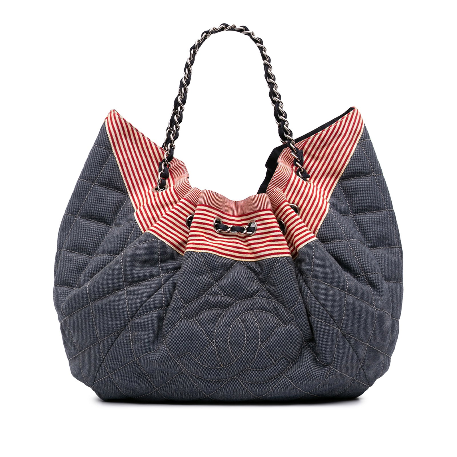 Chanel Stretch Spirit Cabas Large Blue Quilted Denim Tote Bag: Chanel Stretch Spirit Cabas Large Blue Quilted Denim Tote Bag A large Chanel Stretch Spirit Cabas tote crafted with a quilted denim body and a fabric woven chain link shoulder strap. The bag features 