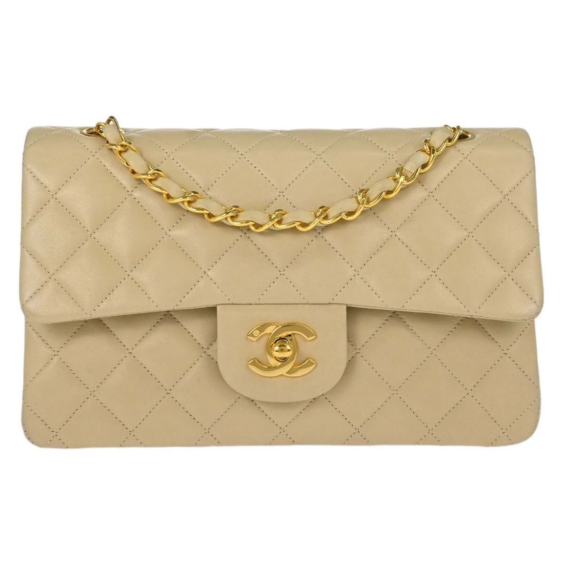CHANEL Classic Double Flap Medium Shoulder Bag Beige Lambskin: CHANEL Classic Double Flap Medium Shoulder Bag Beige Lambskin Chanel Medium Classic Double Flap shoulder bag in beige lambskin leather with a turn-lock closure and shoulder strap. This women's bag