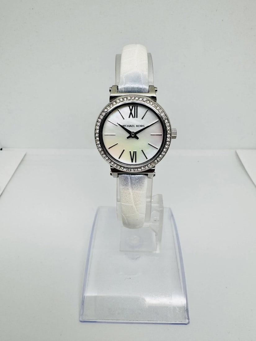 Michael Kors Sofie women's quartz watch 26mm steel MOP dial MK2714: Michael Kors Sofie women's quartz watch 26mm steel MOP dial MK2714 Pre-owned Michael Kors Sofie ladies wristwatch with a quartz movement and analog display. This watch features a round stainless