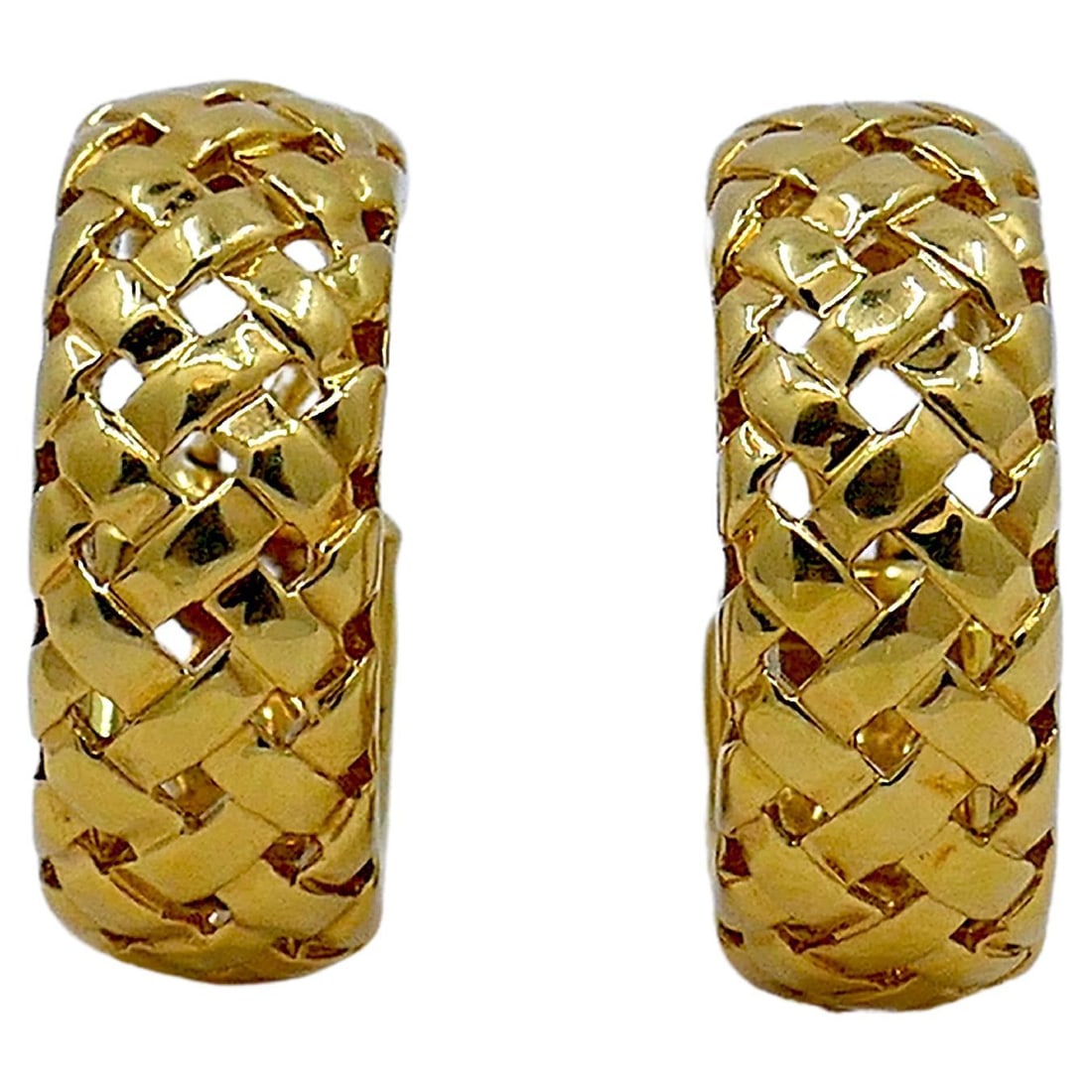 Tiffany Co Vannerie Woven 18k Gold Hoop Earrings Pair: Tiffany Co Vannerie Woven 18k Gold Hoop Earrings Pair A pair of 18k gold woven hoop earrings from the Vannerie collection, crafted in 1995. Designed for pierced ears, they can be modified to clip-ons.