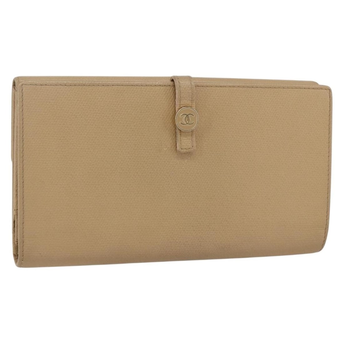 Beige Leather Long Wallet with Gold CC Button by Chanel Coco: Beige Leather Long Wallet with Gold CC Button by Chanel Coco This CHANEL Coco Button long wallet is crafted from beige leather with gold-tone accents. The wallet features a classic long design and inc