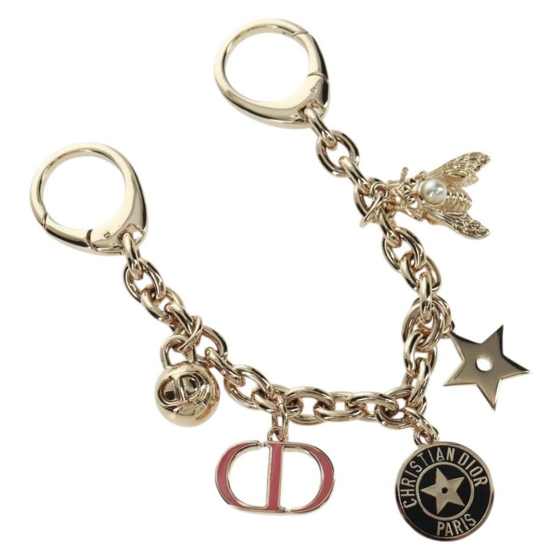Christian Dior 30 Montaigne metal bag charm in gold: Christian Dior 30 Montaigne metal bag charm in gold Authentic Christian Dior 30 Montaigne bag charm in gold-tone metal. This women's accessory is made in France and comes with a dust bag. Condition is