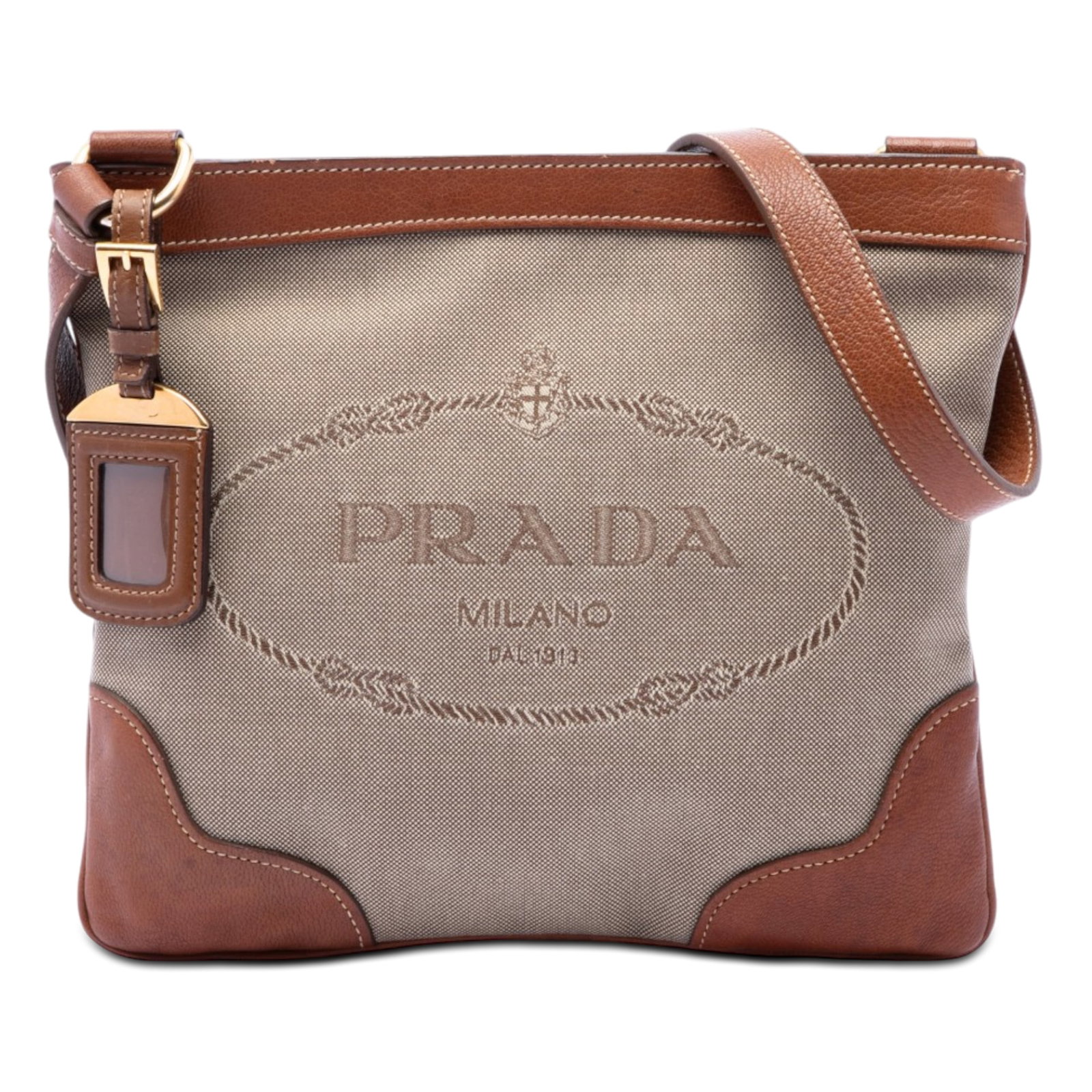 Prada Canapa Logo Canvas Crossbody Bag Beige: Prada Canapa Logo Canvas Crossbody Bag Beige A Prada Canvas Canapa Logo crossbody bag in beige, featuring a canvas body with leather trim, an adjustable flat leather shoulder strap, a top zip closure,