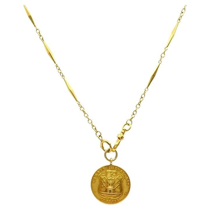 Set of 2 Vintage Gold Necklace 10k Chain with 18k Coin Pendant: Set of 2 Vintage Gold Necklace 10k Chain with 18k Coin Pendant Vintage necklace featuring a 13-inch 10k gold bar and link chain paired with a solid 18k yellow gold coin pendant. The pendant is a doubl