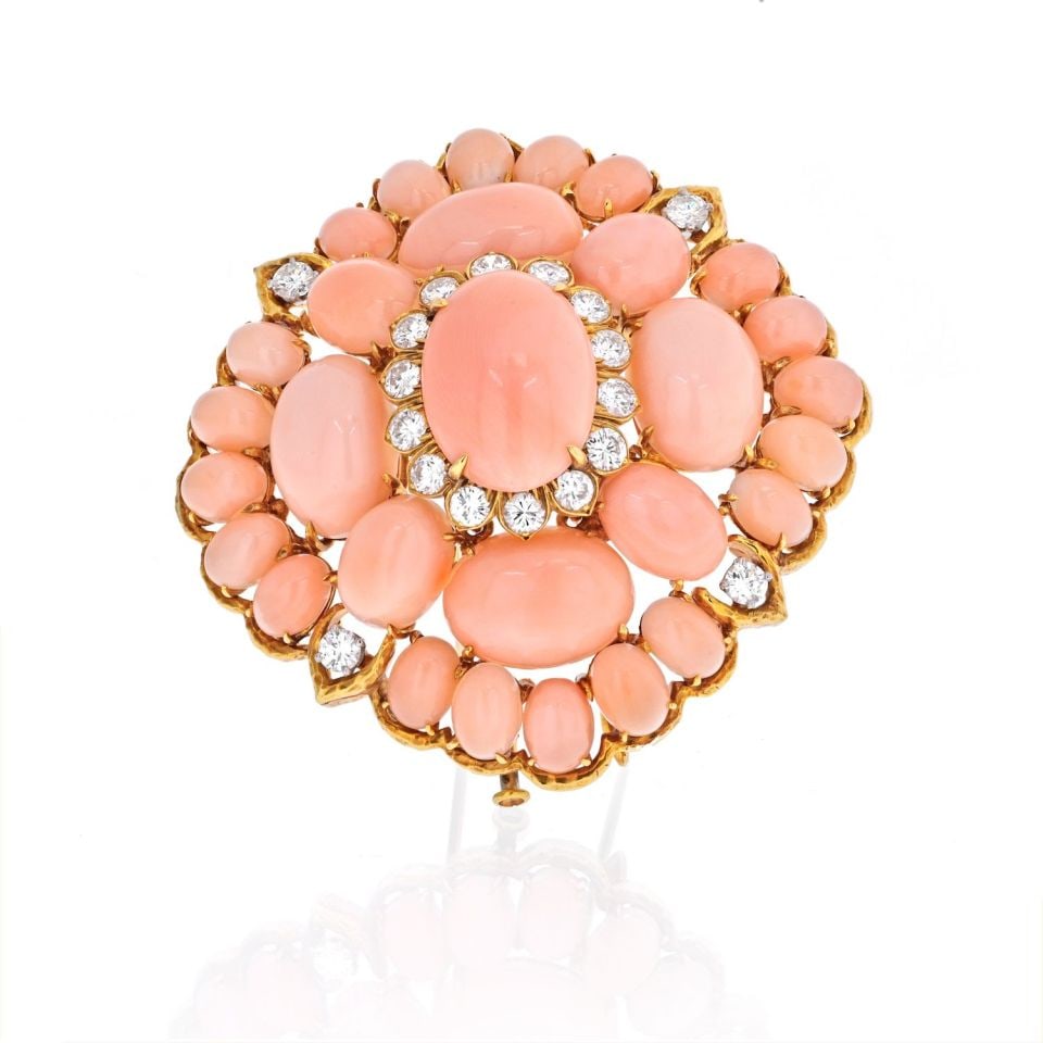 David Webb 18K Yellow Gold Pink Coral Diamond Brooch Pendant: David Webb 18K Yellow Gold Pink Coral Diamond Brooch Pendant This exquisite brooch by David Webb showcases a stunning lozenge-shaped panel crafted from pink coral, beautifully accented with diamonds. 