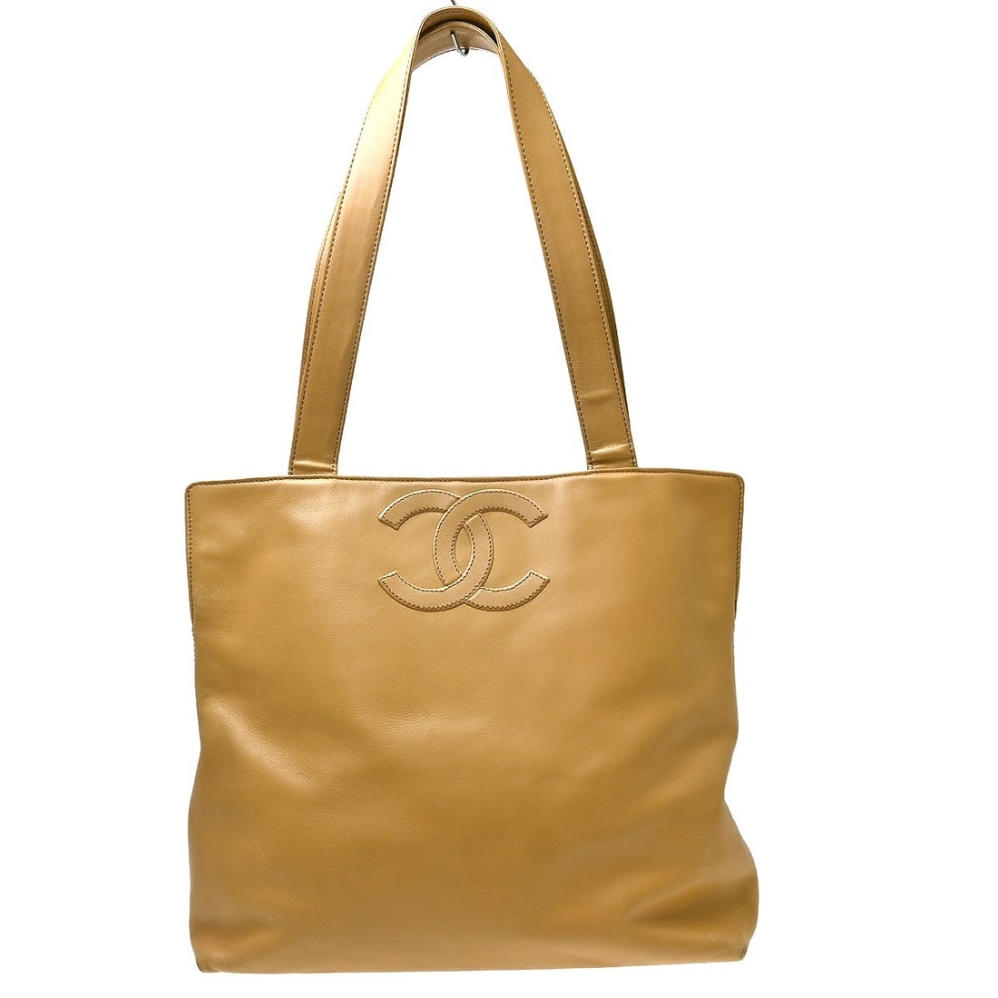 Chanel Vintage CC Logo Leather Tote Bag Beige: Chanel Vintage CC Logo Leather Tote Bag Beige Vintage Chanel CC Logo Tote in beige leather with a classic structured silhouette. Made in Italy, this women's bag is presented in good condition with lig
