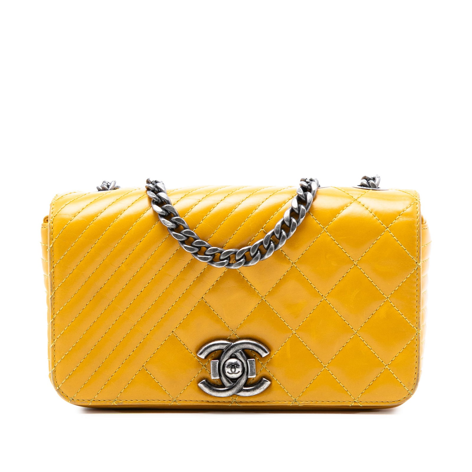 Chanel Coco Boy Flap Yellow Quilted Calfskin Shoulder Bag: Chanel Coco Boy Flap Yellow Quilted Calfskin Shoulder Bag This Chanel Small Glazed Calfskin Coco Boy Flap is a stylish shoulder bag crafted from quilted calfskin leather in yellow. It features leather