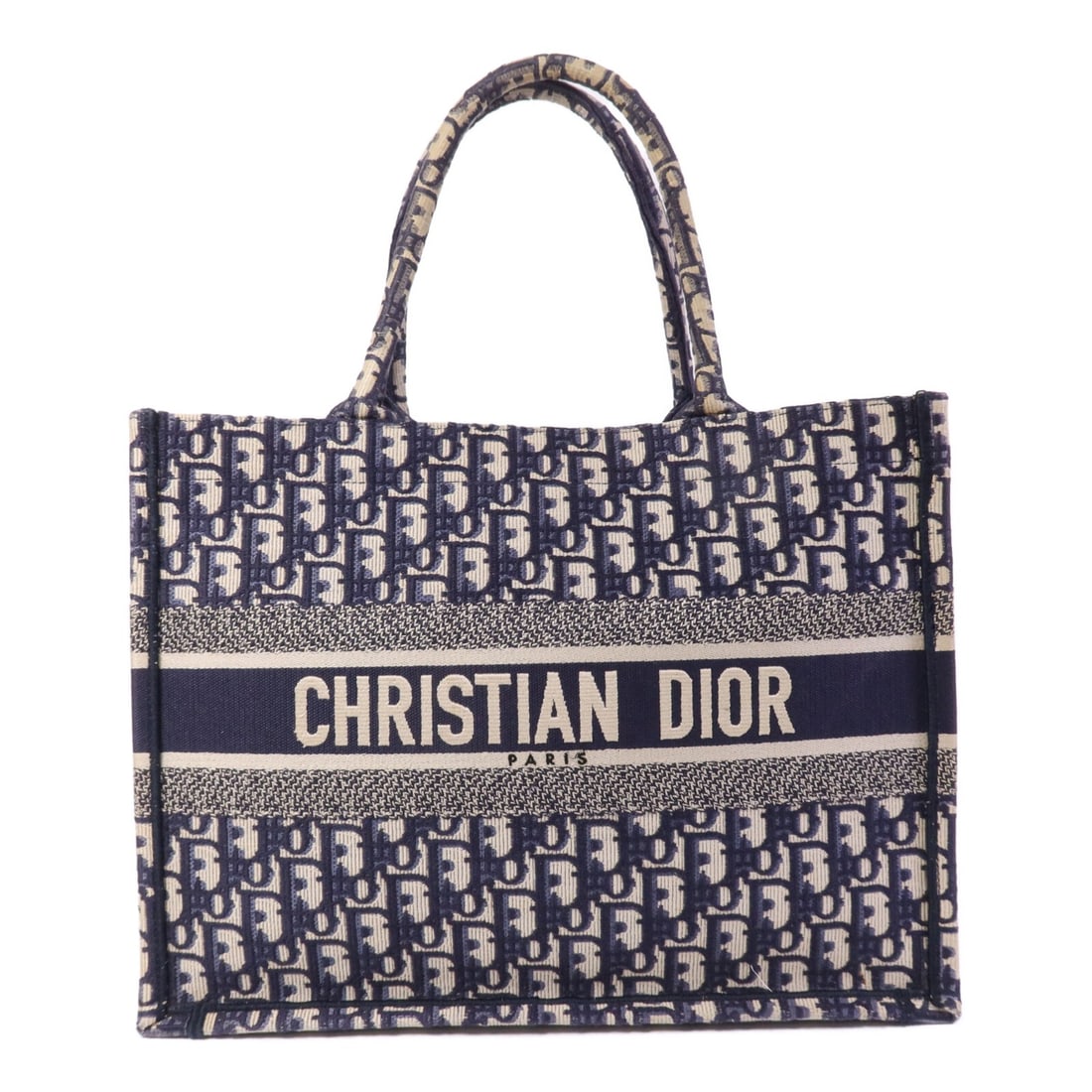Dior CD Book Tote Medium Blue Canvas Bag: Dior CD Book Tote Medium Blue Canvas Bag Christian Dior CD Book Tote Medium Tote Bag in blue canvas. This women's tote bag is from France and comes with a storage bag. The item is in B: reasonable wea