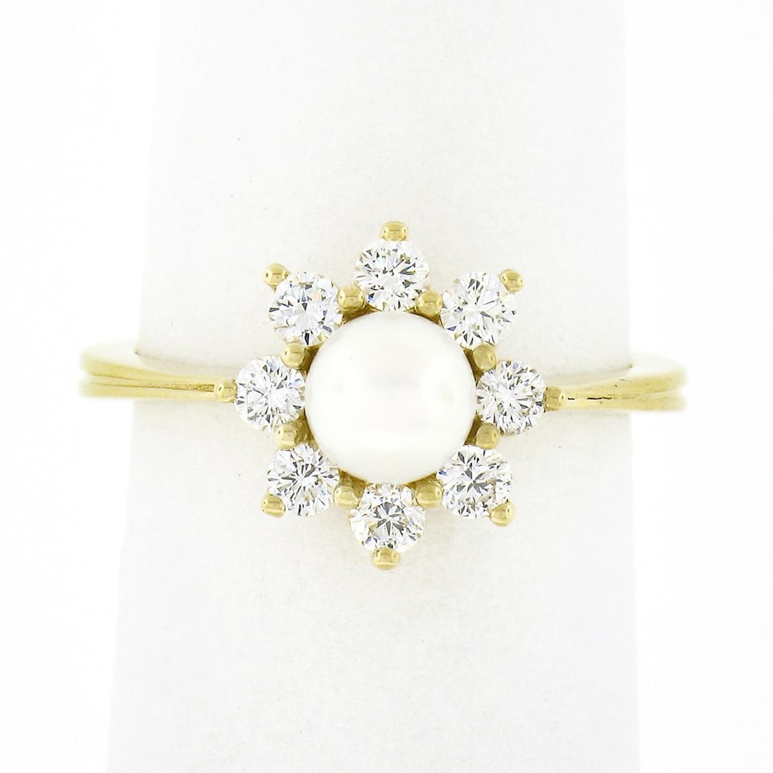 18K Yellow Gold Pearl Diamond Flower Cluster Cocktail Ring 6.5: 18K Yellow Gold Pearl Diamond Flower Cluster Cocktail Ring 6.5 Classic flower cluster ring crafted in 18k solid yellow gold, featuring a round cultured pearl accented by round brilliant cut diamonds. 