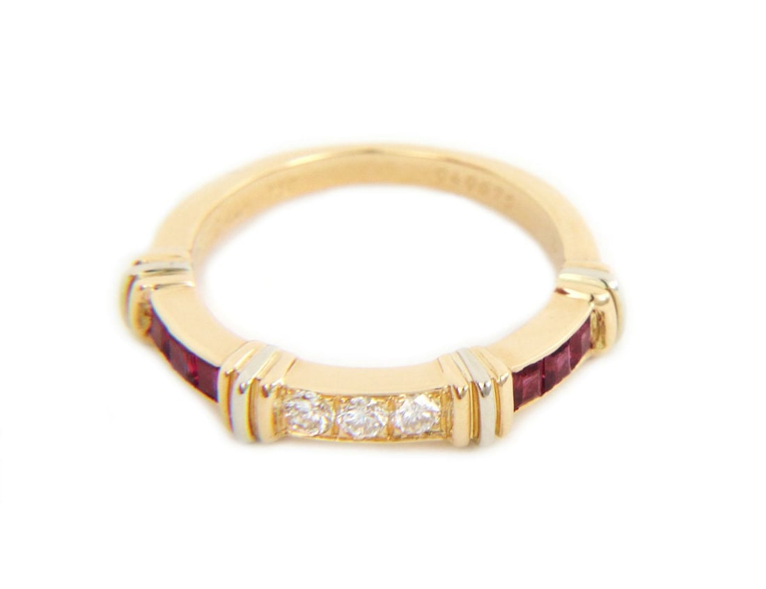 Cartier Contessa Diamond Ruby 18k Gold Ring Size 49-US 5: Cartier Contessa Diamond Ruby 18k Gold Ring Size 49-US 5 This exquisite Cartier Contessa ring showcases a stunning design crafted from 18k yellow gold with white gold accents. The front features three