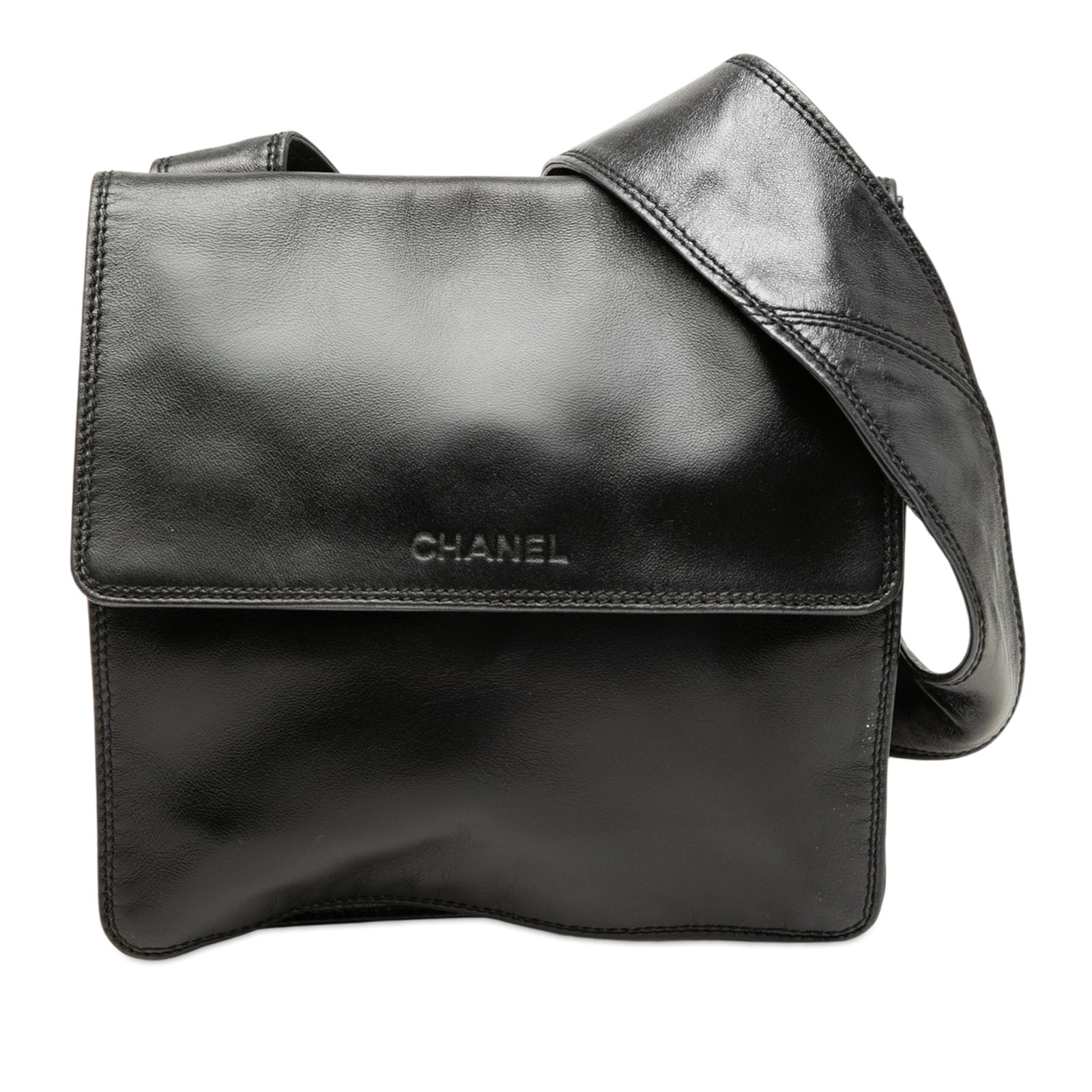 Chanel Lambskin Logo Black Leather Crossbody Flap Bag: Chanel Lambskin Logo Black Leather Crossbody Flap Bag Chanel Lambskin Logo Messenger Bag in black leather with a front flap, flat leather strap, and an interior zip pocket. Made in Italy. Condition
