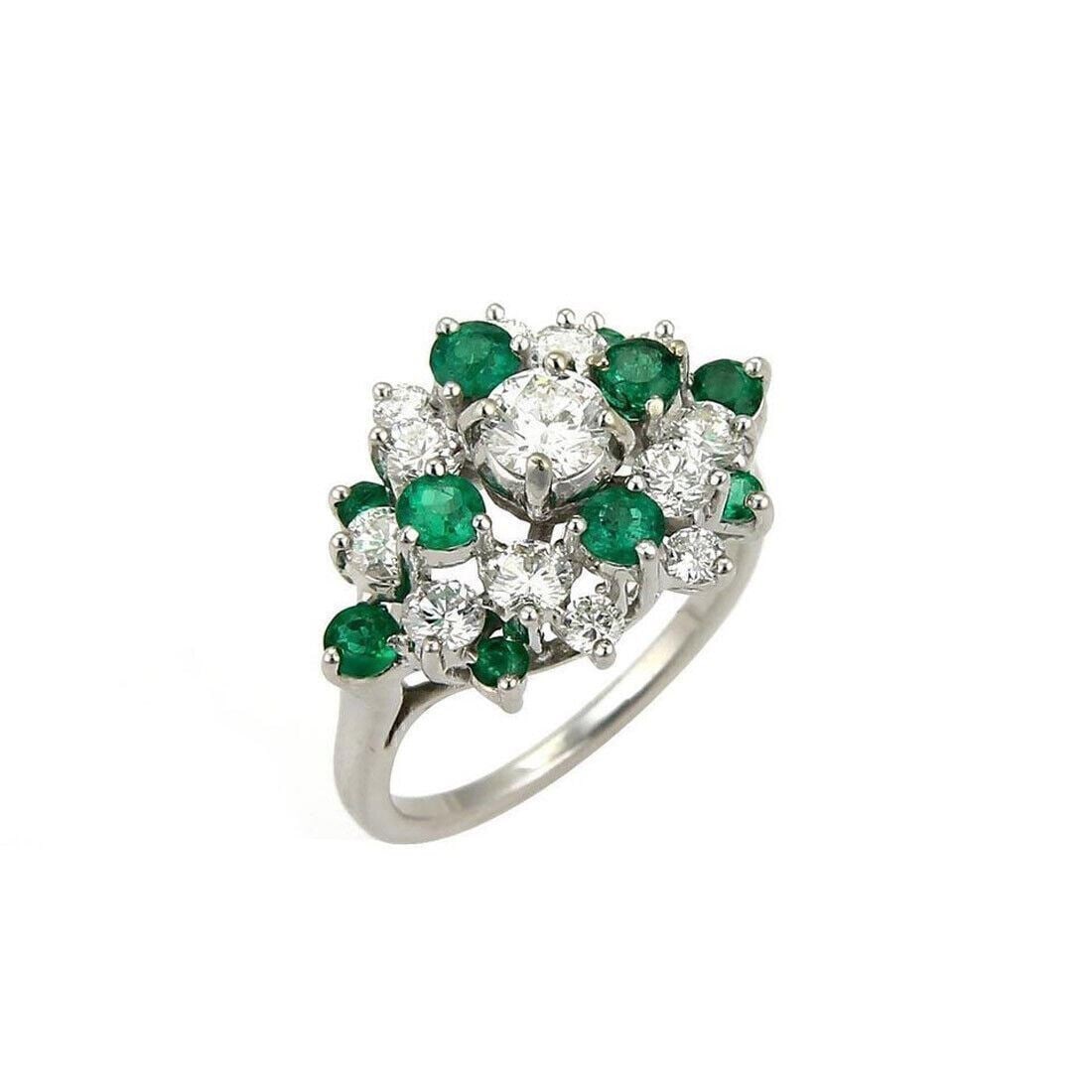 14k White Gold Diamond Emerald Cluster Ring Unbranded Size 6: 14k White Gold Diamond Emerald Cluster Ring Unbranded Size 6 Vintage/estate style cluster ring crafted in 14k white gold, featuring a center diamond accented by additional diamonds and emeralds in an 