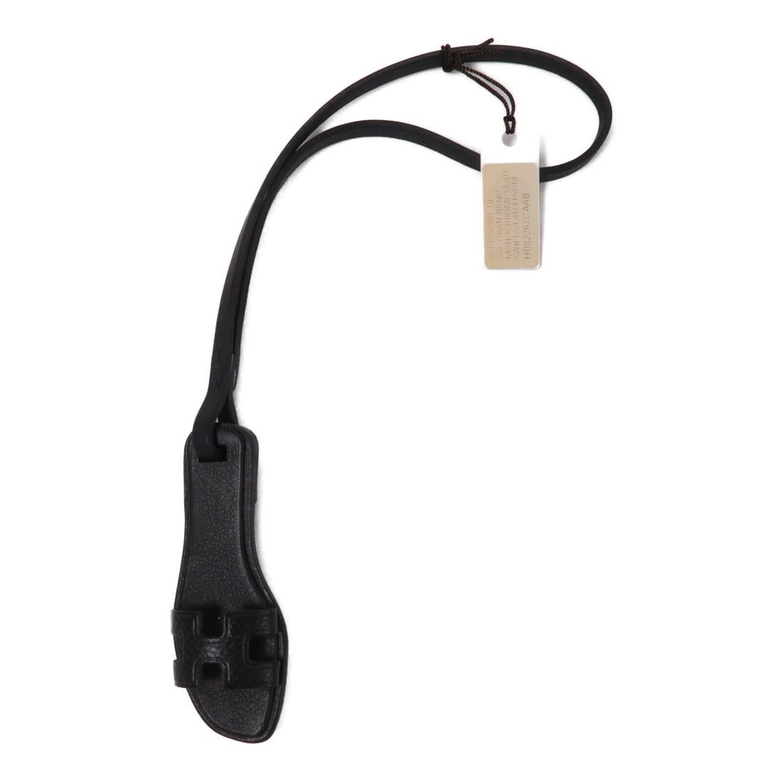 Hermes Oran Nano charm in Noir calfskin with storage box: Hermes Oran Nano charm in Noir calfskin with storage box Hermes Oran Nano charm in noir black calfskin, crafted in France. This women's charm comes with a storage box and is in AB: Very Good condition