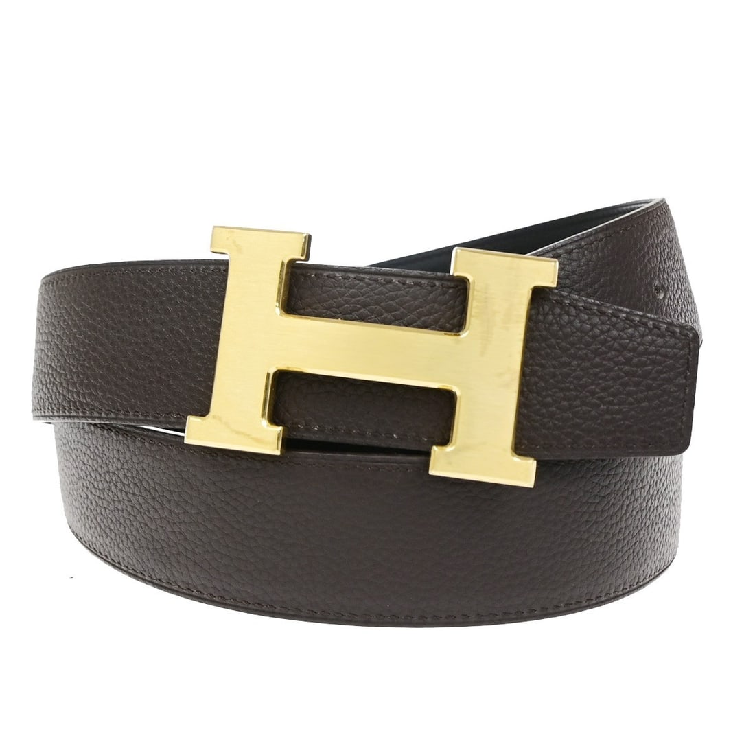 Hermes Constance Leather Reversible Belt Brown Unisex: Hermes Constance Leather Reversible Belt Brown Unisex Hermes Constance Reversible Belt in brown leather, designed as a unisex accessory. Made in France, it measures 7.5 cm wide by 4.5 cm high. The