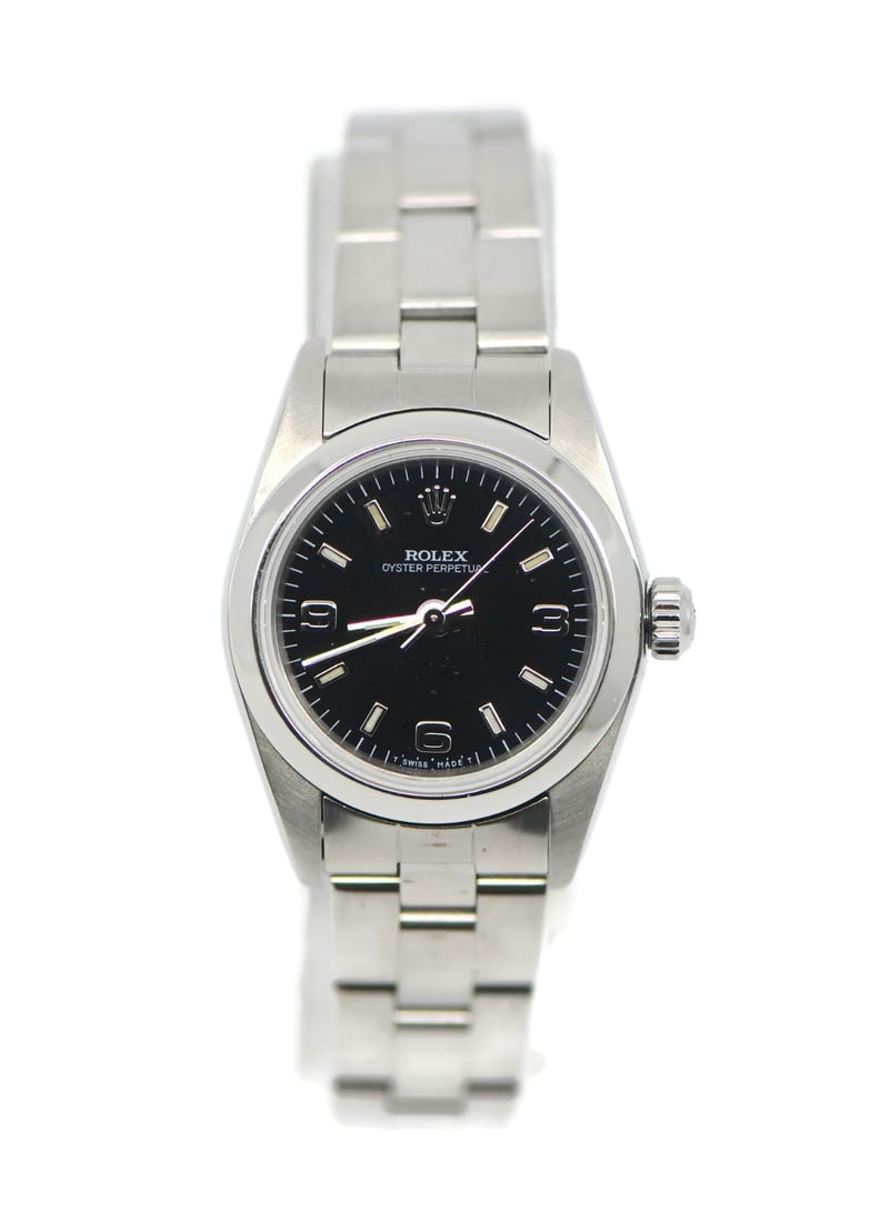 Rolex Oyster Perpetual 76080 stainless steel wristwatch with box: Rolex Oyster Perpetual 76080 stainless steel wristwatch with box Pre-owned women's Rolex Oyster Perpetual wristwatch in stainless steel with a round case, smooth silver bezel, black analog dial, and s