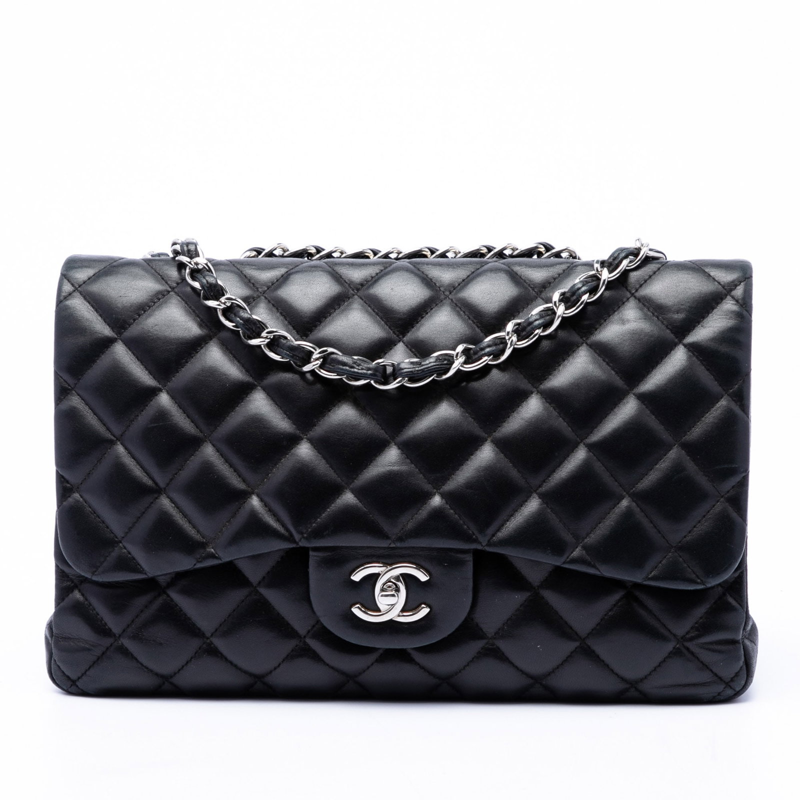 Chanel Jumbo Classic Single Flap Shoulder Bag Black Lambskin: Chanel Jumbo Classic Single Flap Shoulder Bag Black Lambskin Chanel Jumbo Classic Lambskin Single Flap shoulder bag in black quilted lambskin leather. This bag features leather-woven chain straps, a f