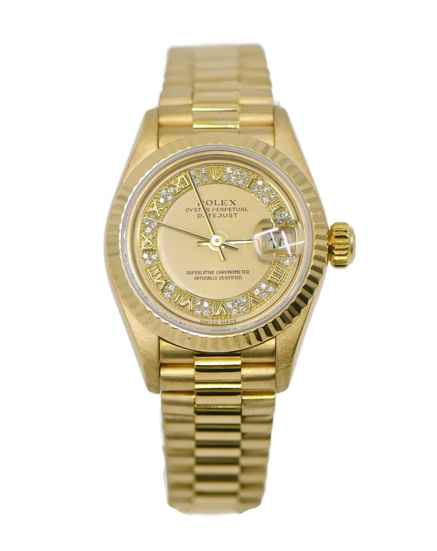 Rolex 79178 Datejust 18K Yellow Gold Diamond Women's Watch: Rolex 79178 Datejust 18K Yellow Gold Diamond Women's Watch A pre-owned Rolex Datejust women's wristwatch in 18K yellow gold, featuring diamond markers and a champagne diamond dial. It has a 26 mm roun