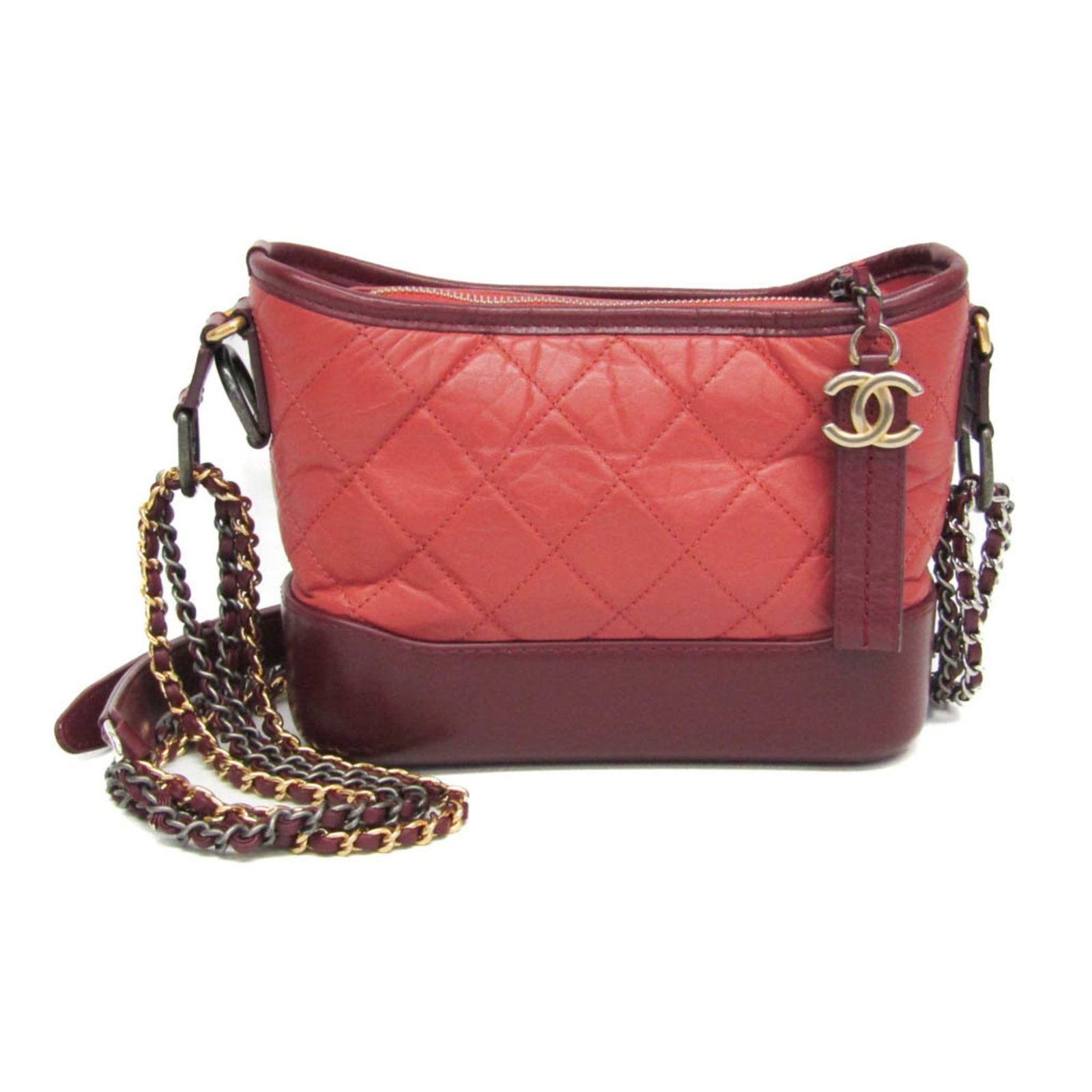 Chanel Gabrielle Hobo Pink Quilted Calfskin Bag: Chanel Gabrielle Hobo Pink Quilted Calfskin Bag This Chanel Gabrielle Hobo bag is crafted from quilted aged calfskin leather in a striking pink color. Designed for women, it features a compact silhoue