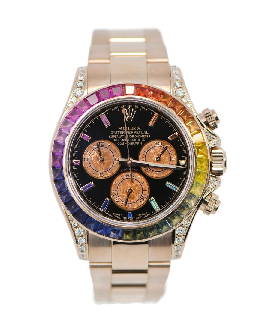 Rolex Daytona Rainbow 18K Rose Gold Automatic Watch With Box and Papers: Rolex Daytona Rainbow 18K Rose Gold Automatic Watch With Box and Papers This Rolex Daytona Rainbow is a luxurious unisex wristwatch featuring a 40mm case crafted from 18K rose gold. The watch is power