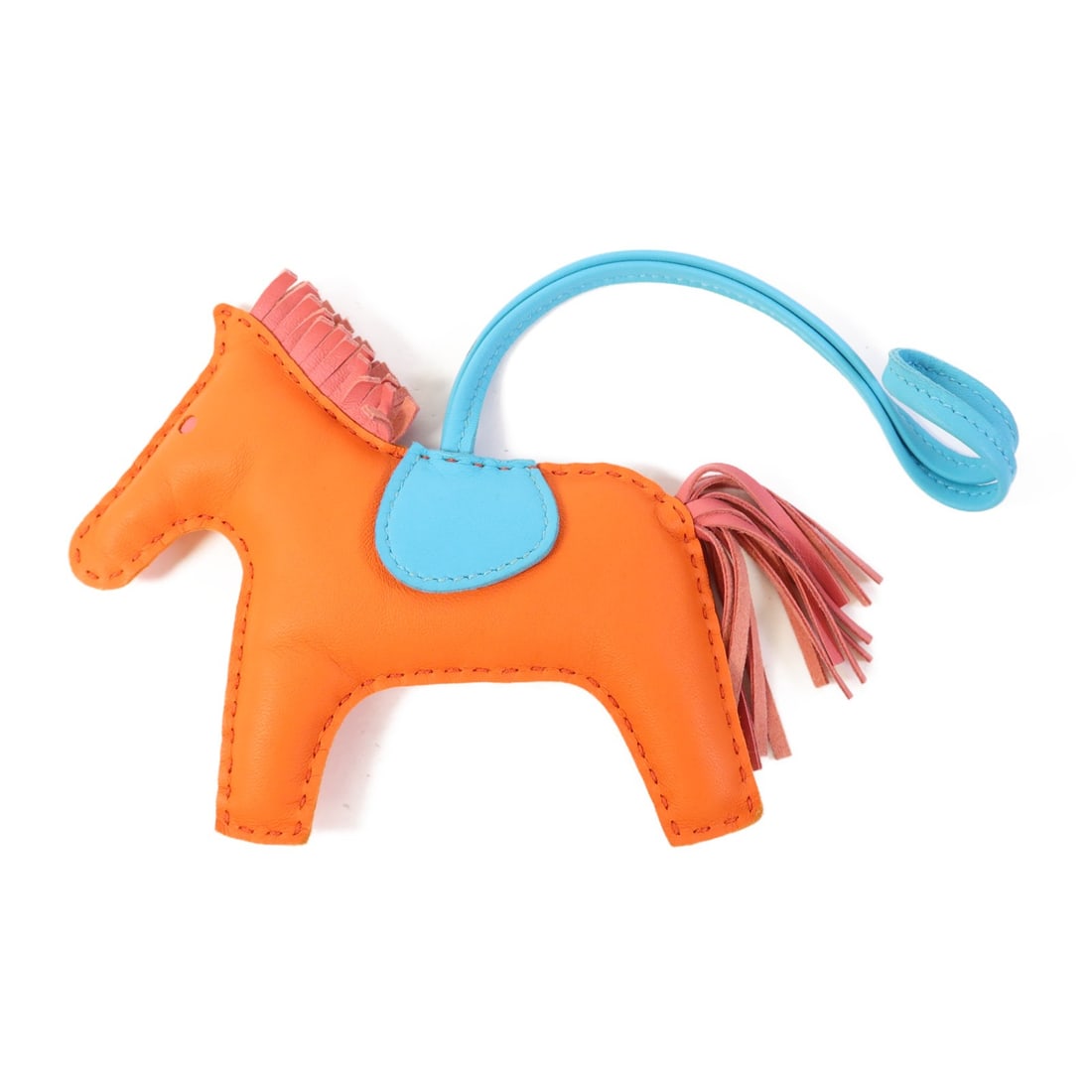 Hermes Rodeo MM lambskin bag charm orange blue pink: Hermes Rodeo MM lambskin bag charm orange blue pink Hermes Rodeo MM charm crafted in Agneau Milo lambskin leather with a multicolor orange, blue, and pink design. Made in France, this women's charm in