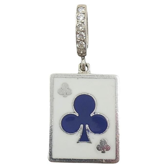 Vintage 12k Gold Enamel Playing Card Charm with Pave Diamond Bail: Vintage 12k Gold Enamel Playing Card Charm with Pave Diamond Bail Vintage charm crafted in 12k gold with a playing card club design in blue enamel on a white background. The rectangular pendant featur