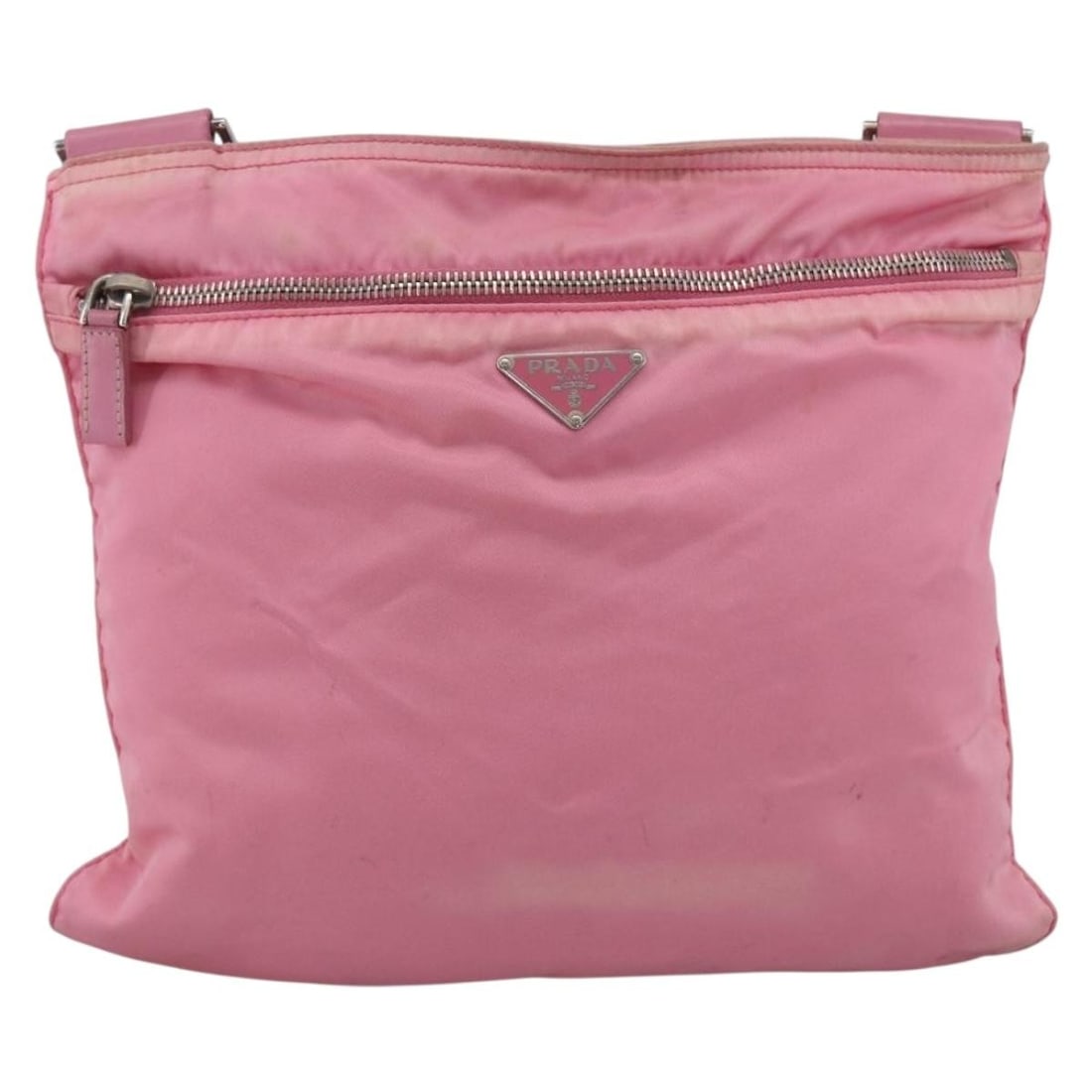 Prada Tessuto Pink Nylon Front Pocket Messenger Bag: Prada Tessuto Pink Nylon Front Pocket Messenger Bag This Prada Front Pocket Messenger Bag is crafted from pink nylon and designed for women. The bag features a front pocket and is made in Italy. It sh